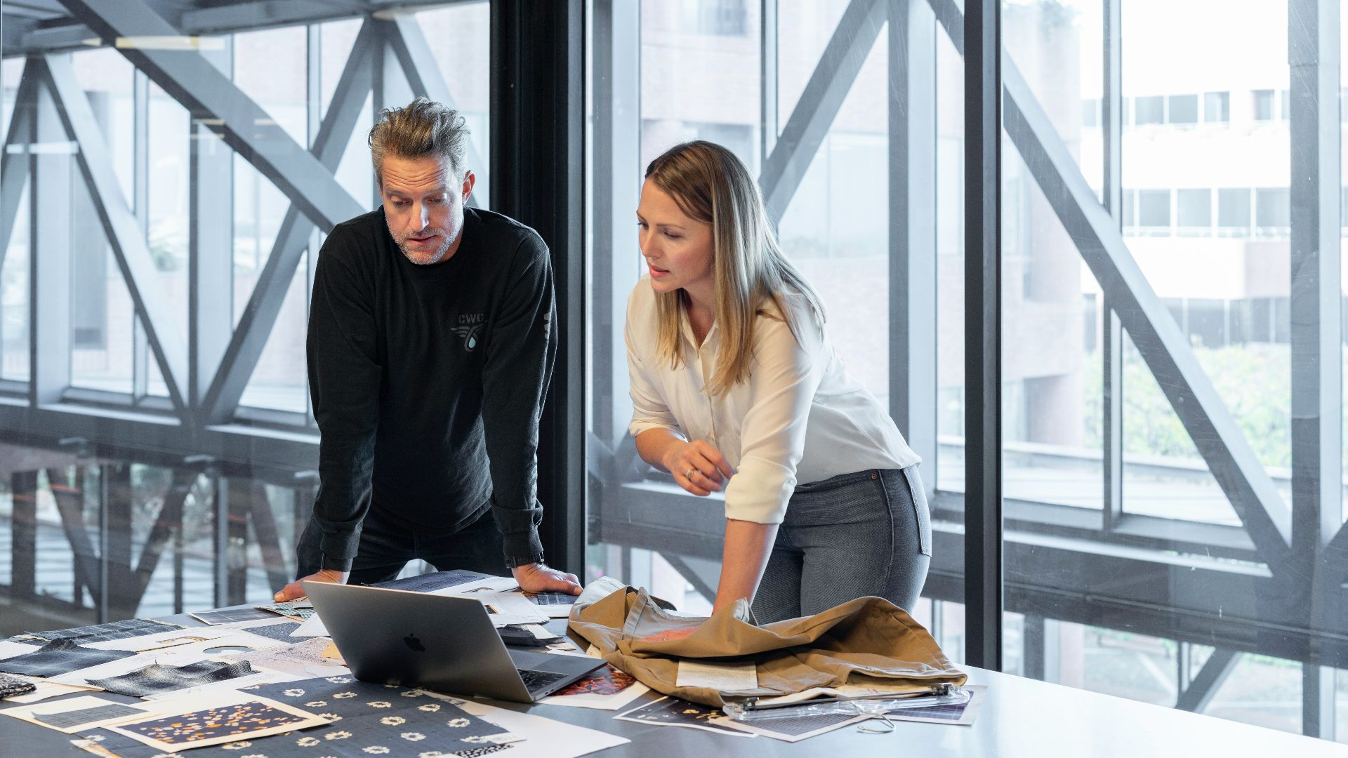 man and woman sitting at table