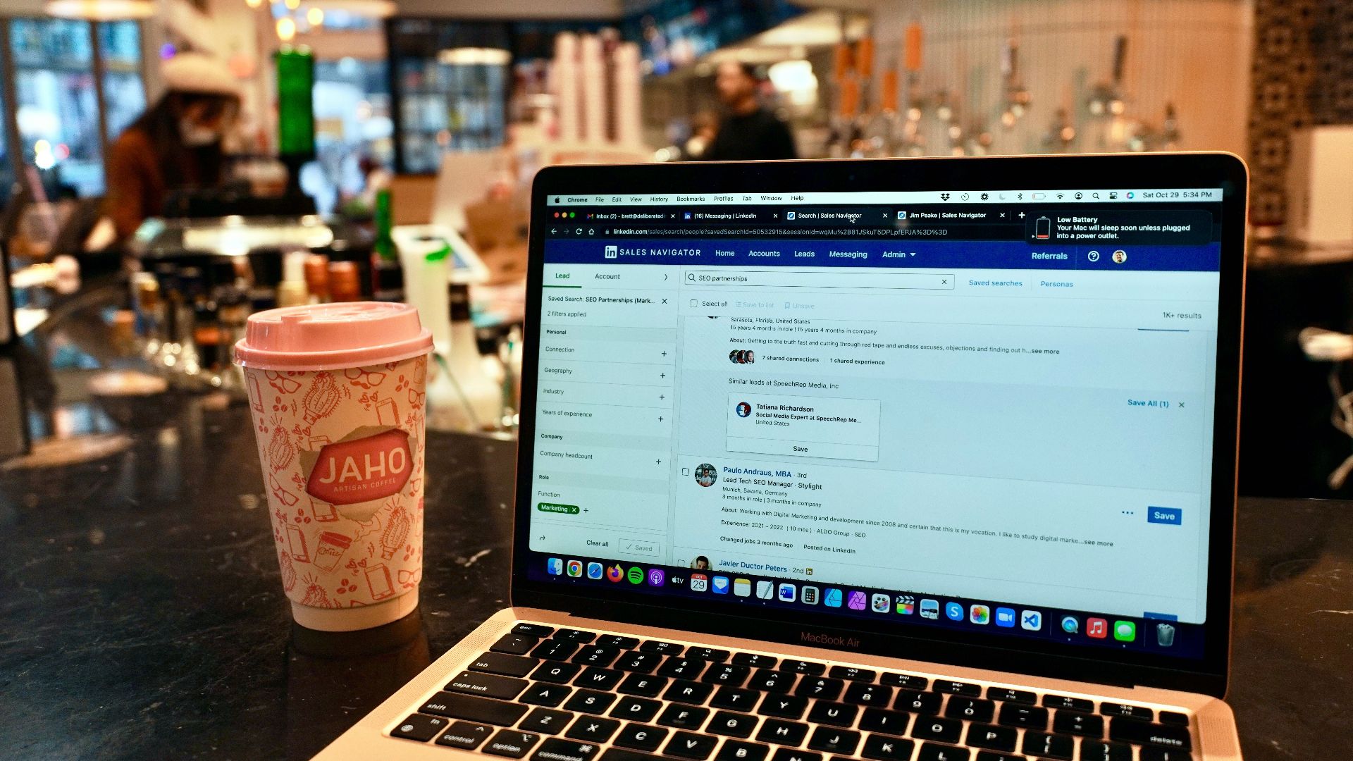 a laptop computer sitting on top of a table