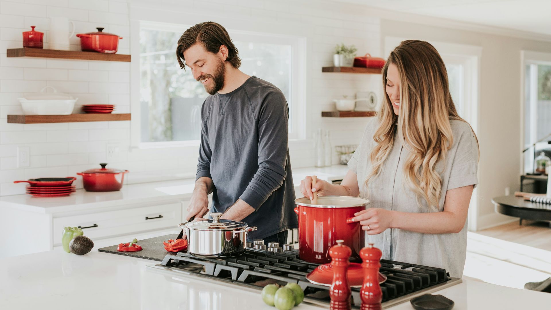 man and woman on kitchen