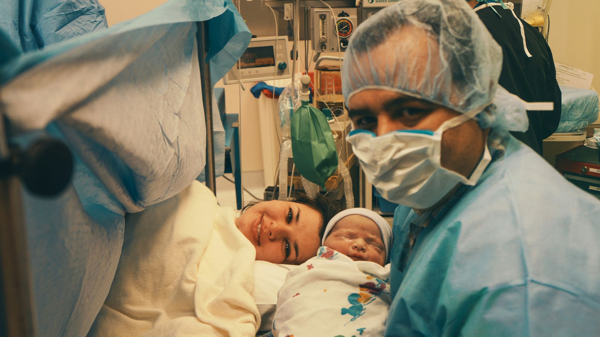 man in white dress shirt lying on hospital bed