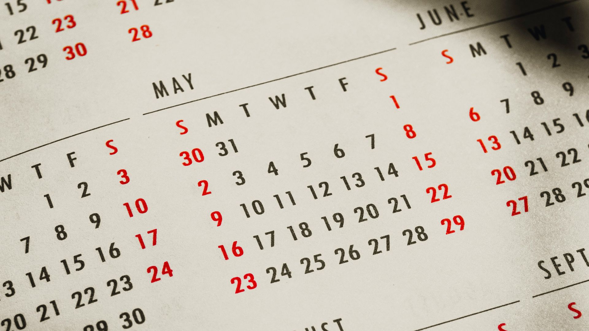 a close up of a calendar on a table
