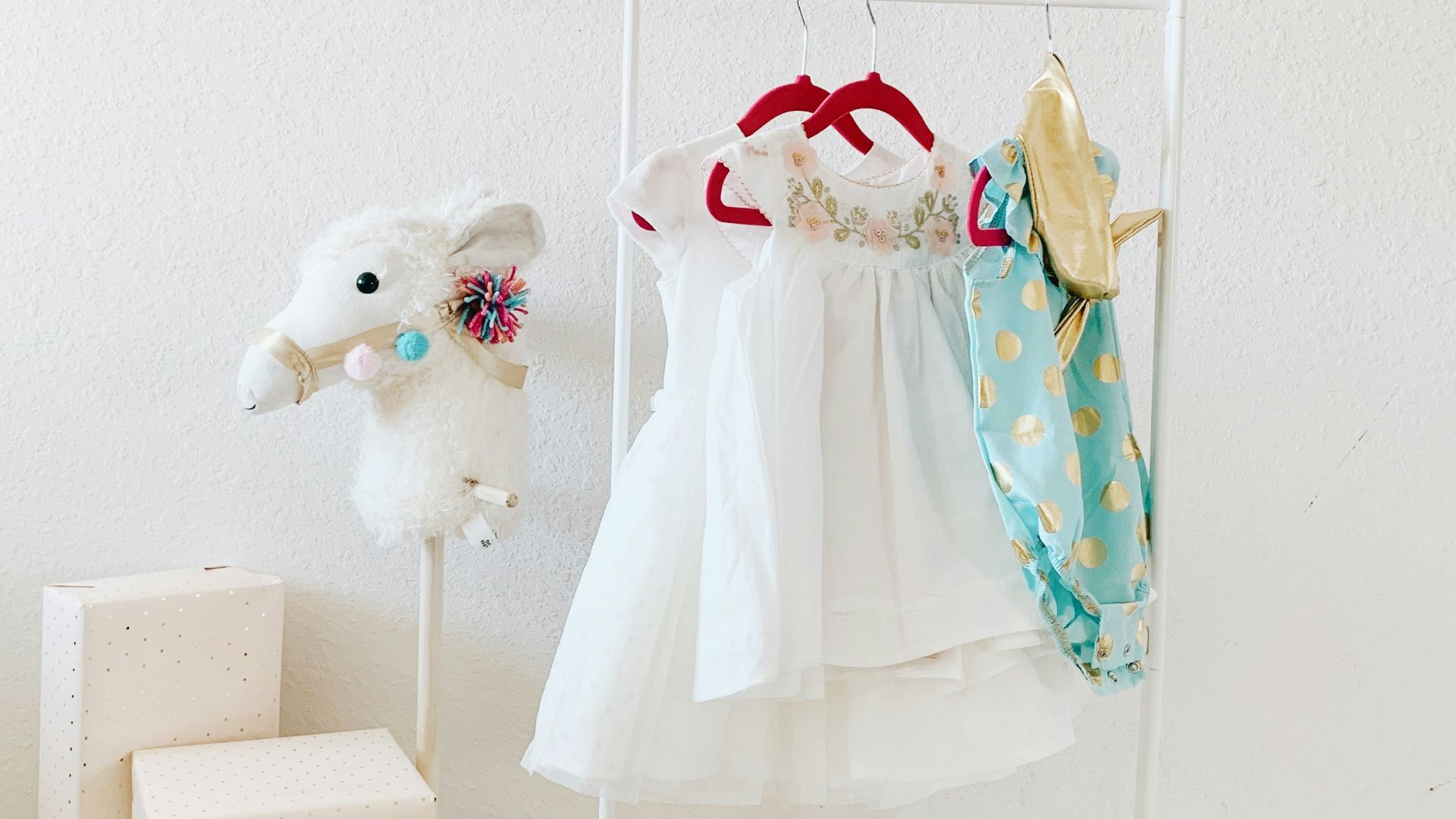 toddler's clothes hanged on rack