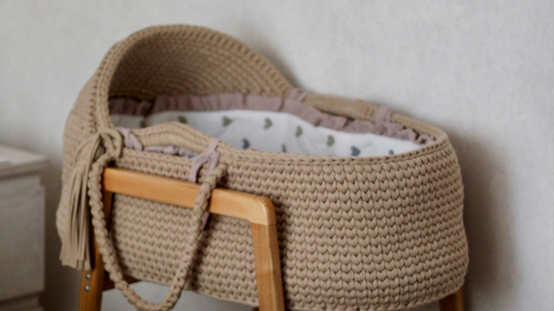 A bed with a basket on top of it