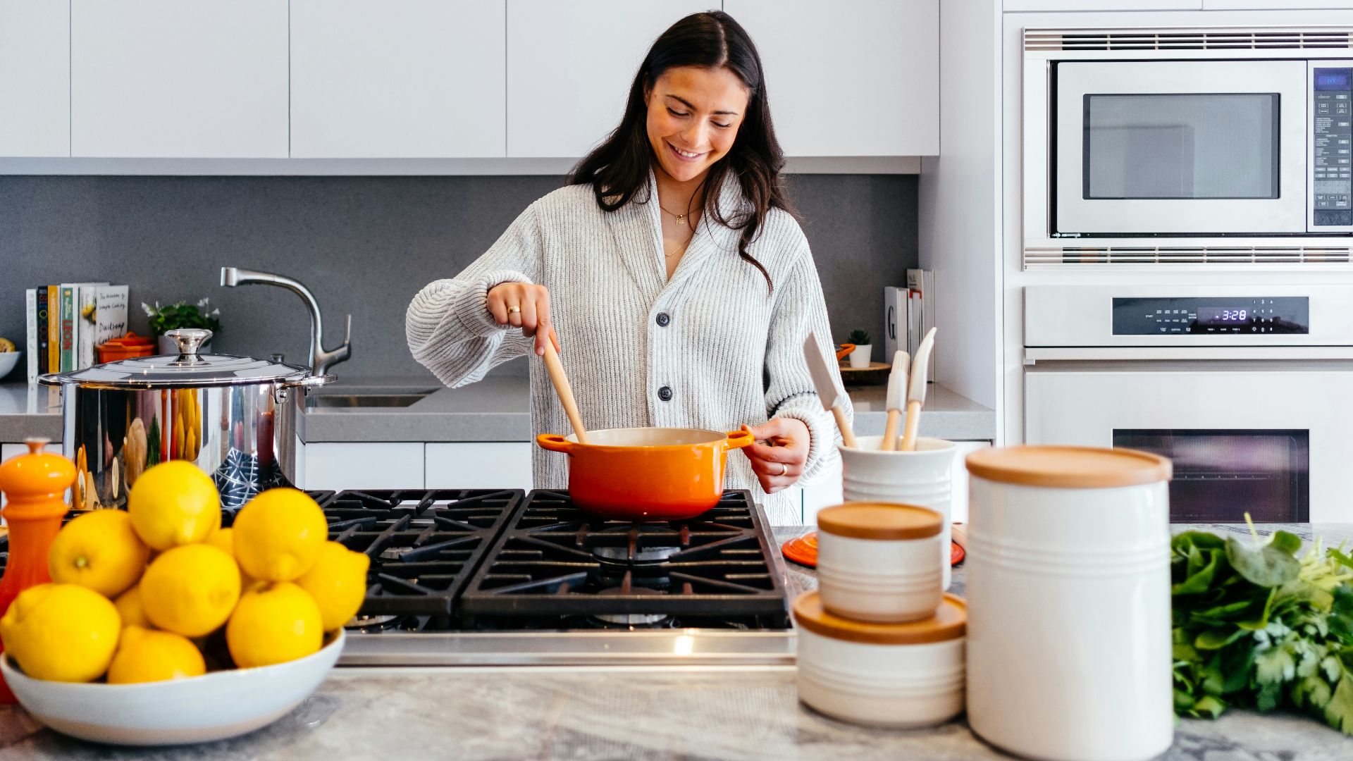 woman cooking inside kitchen room