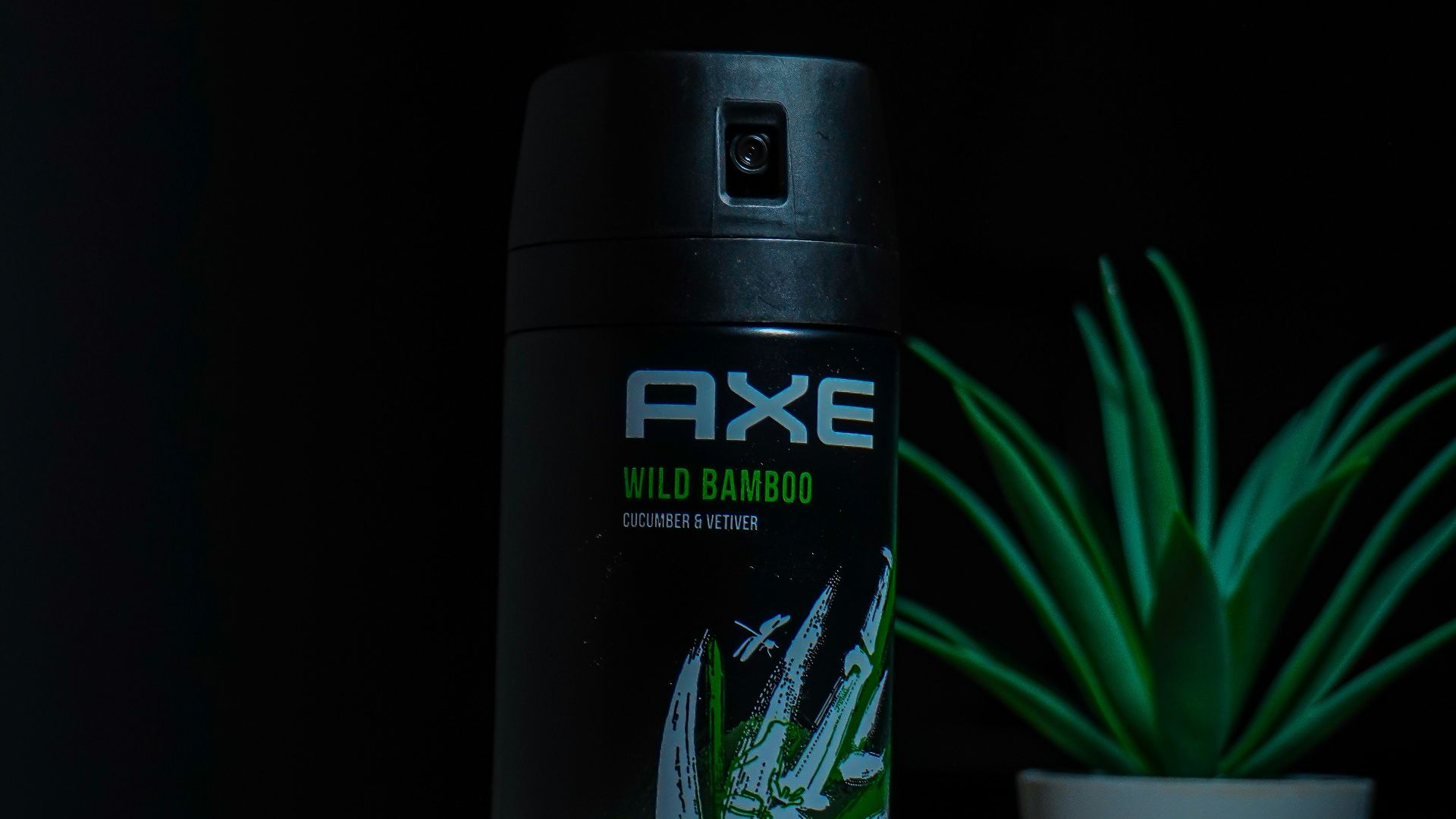 a close up of a can of deodorant on a table