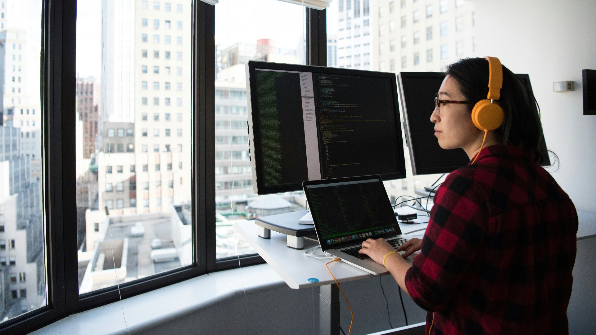 woman using MacBook Pro