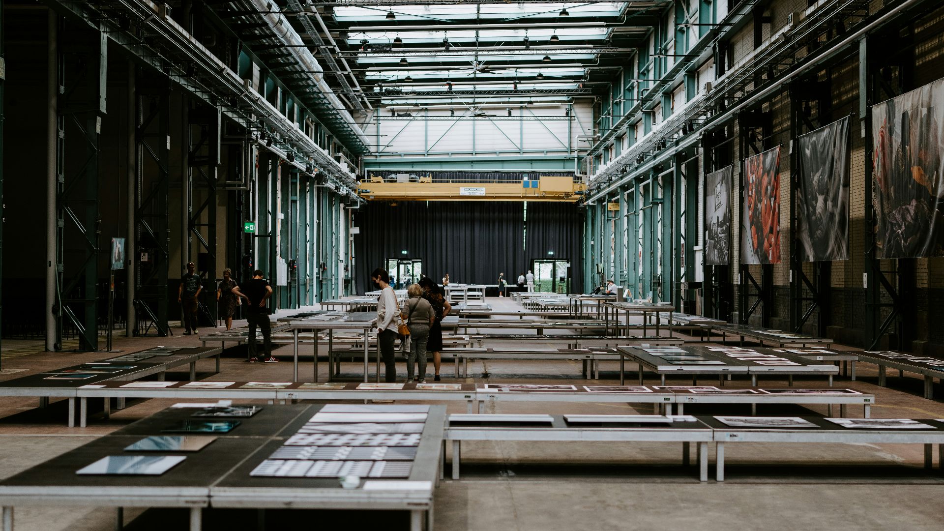 man in black jacket sitting on chair