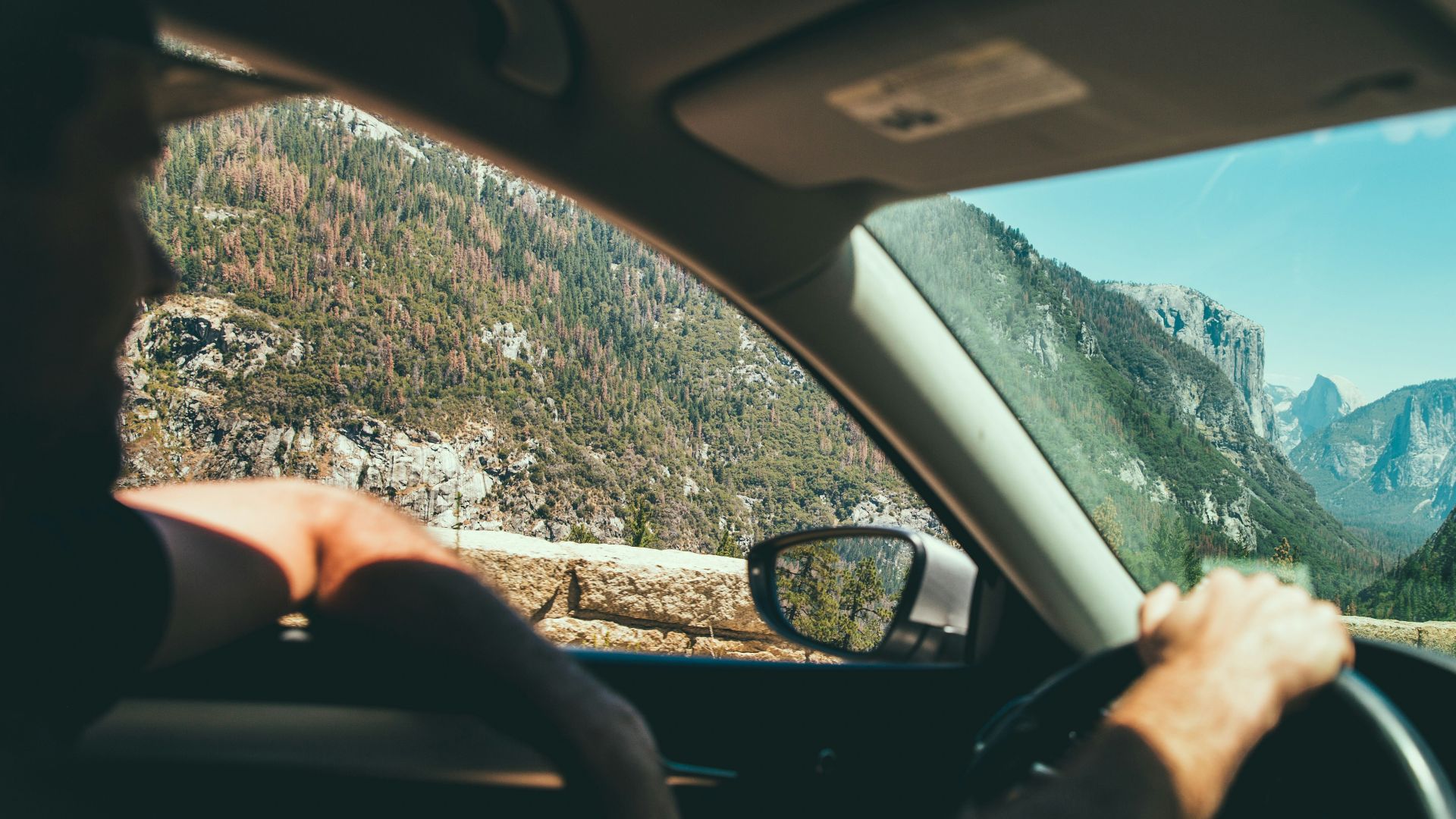 smiling man while driving
