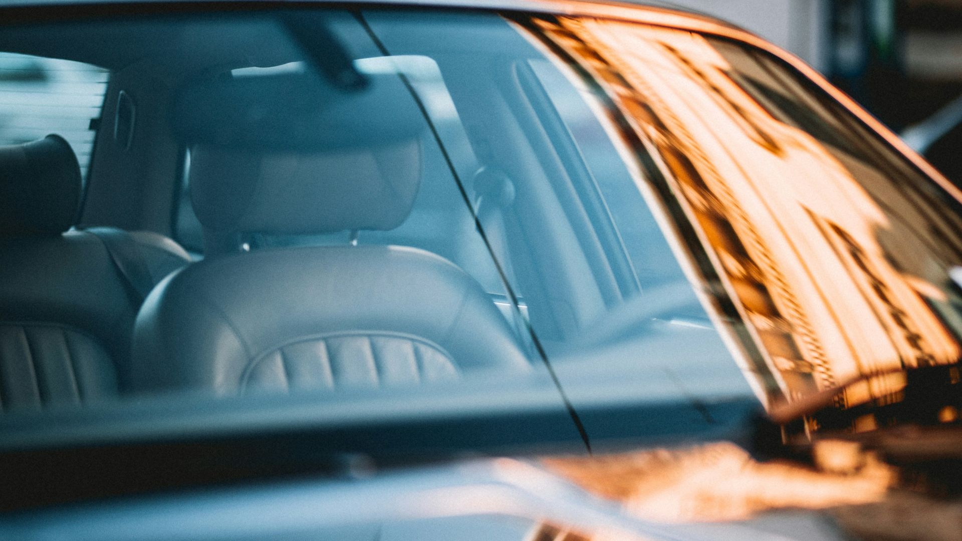 close-up photography of black vehicle during daytime