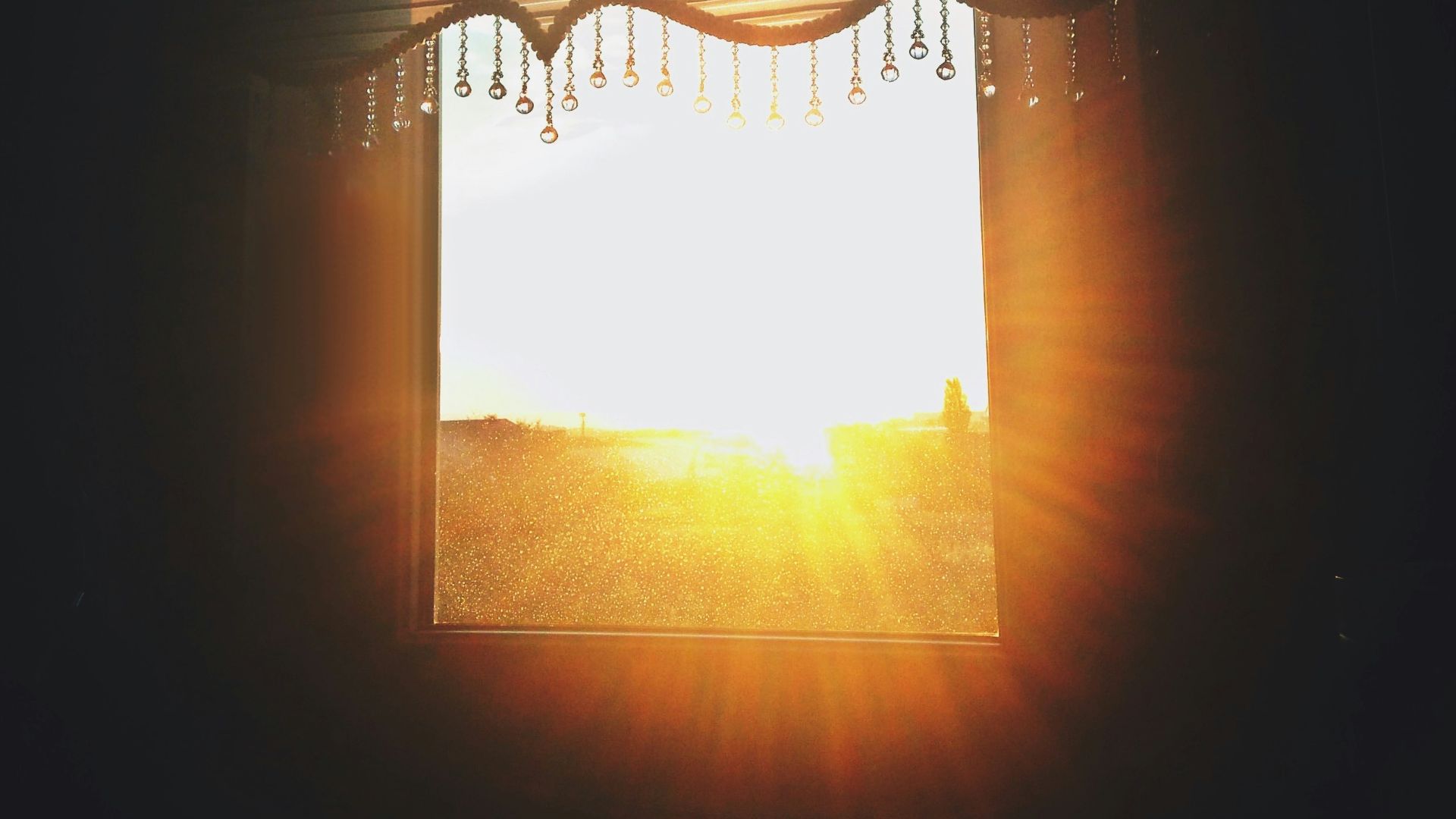 open blinds of window against sun rays
