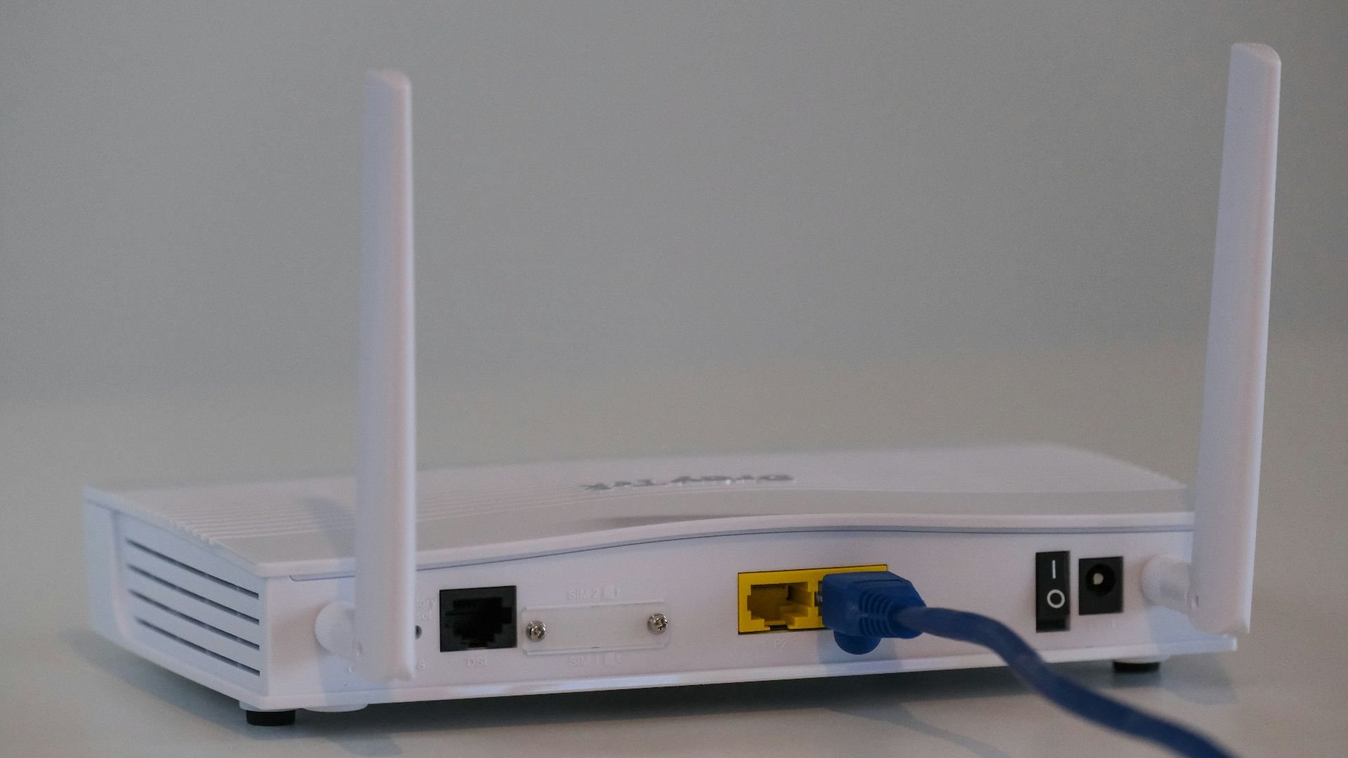 white router on white table