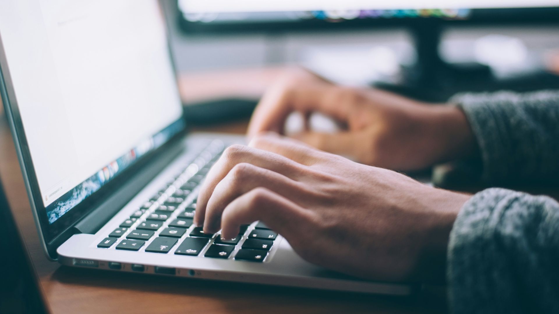 person using MacBook Pro