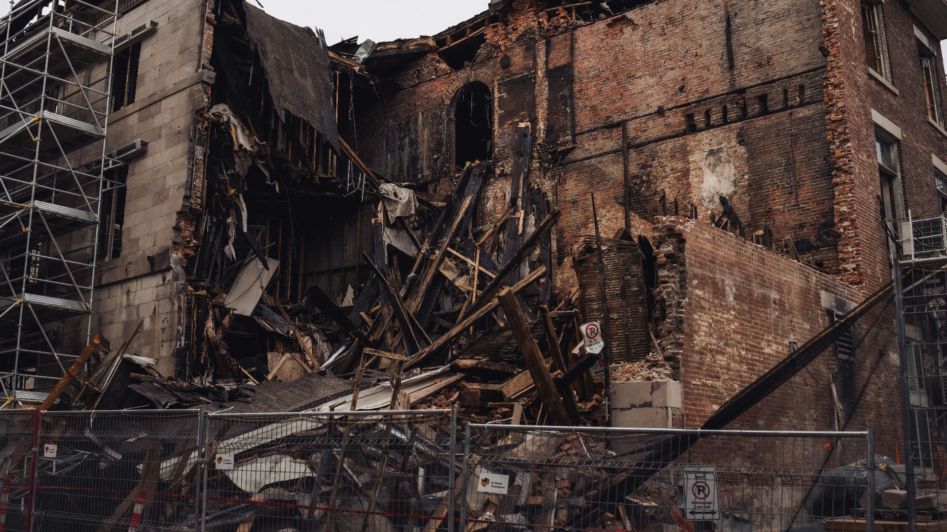 A damaged building is partially collapsed.