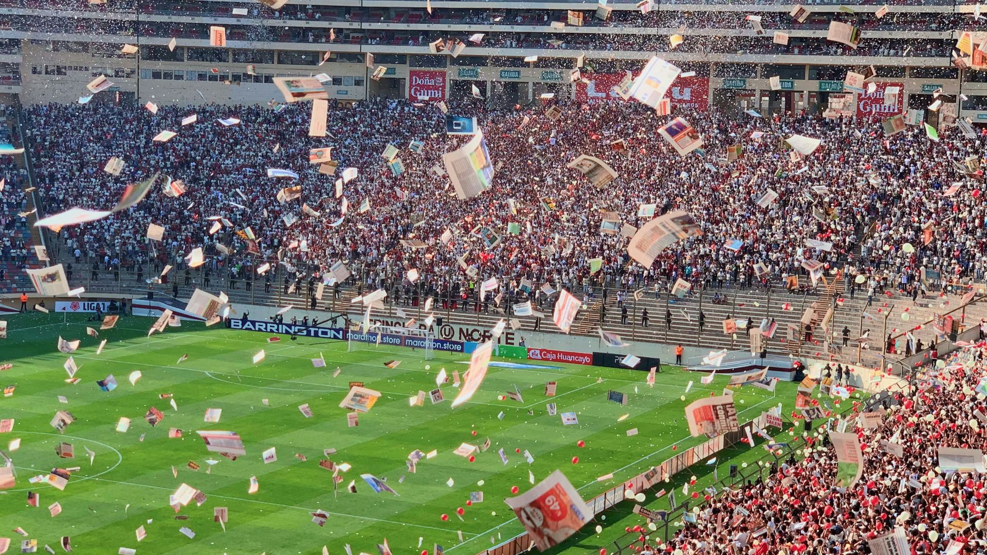 a large stadium filled with lots of people