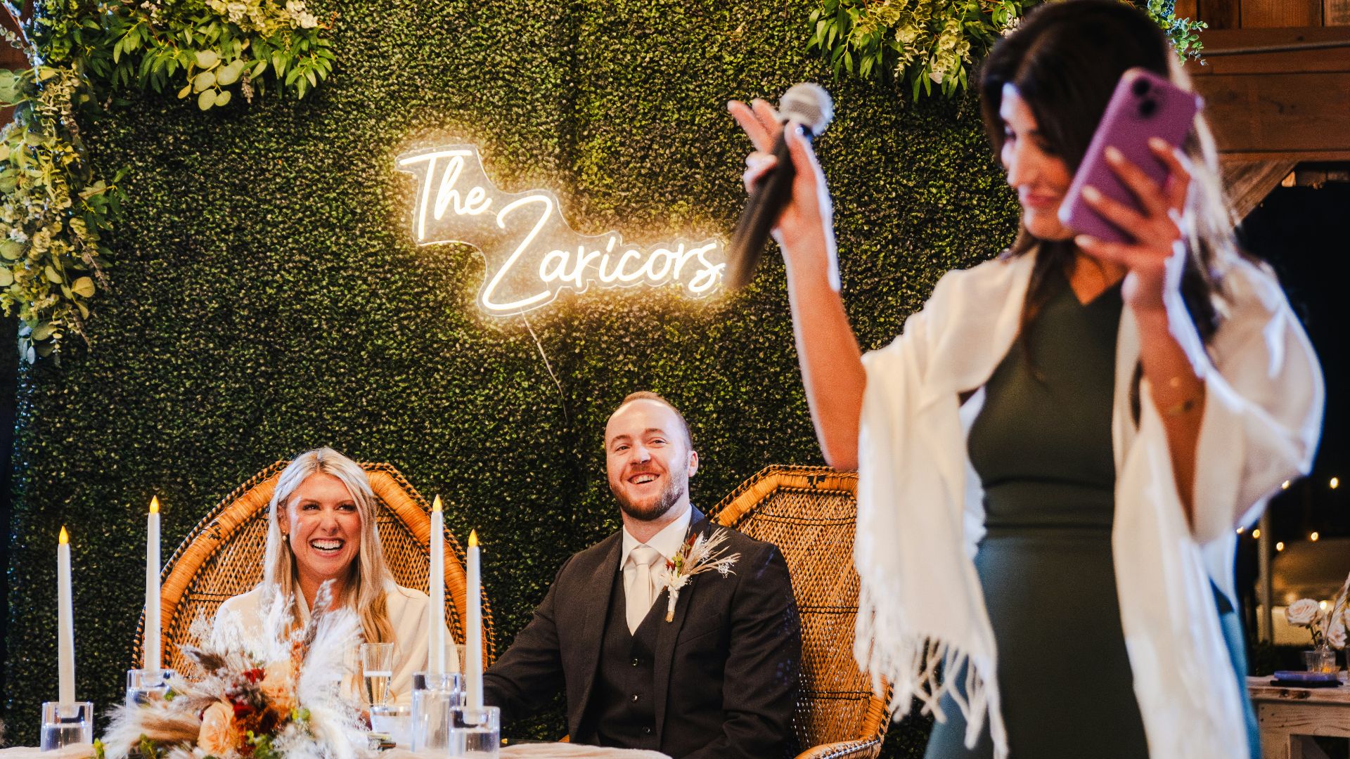 A woman taking a picture with her cell phone