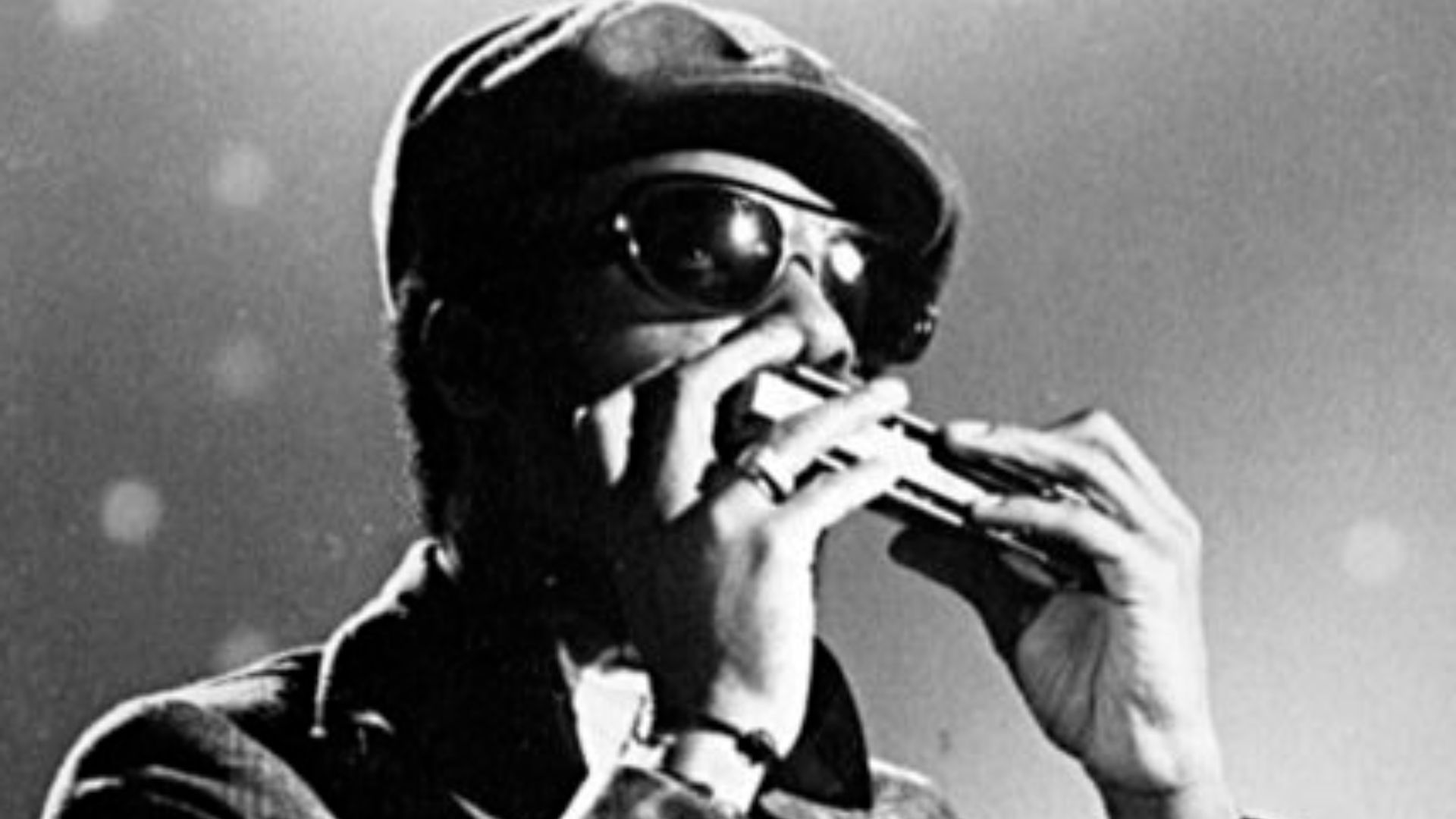 File:Stevie Wonder playing harmonica.png