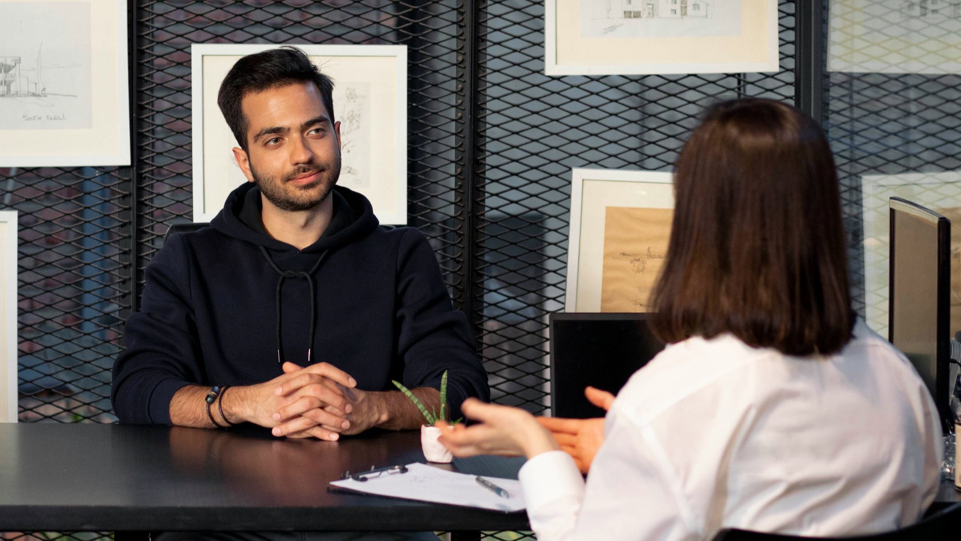 a man and a woman sitting at a table