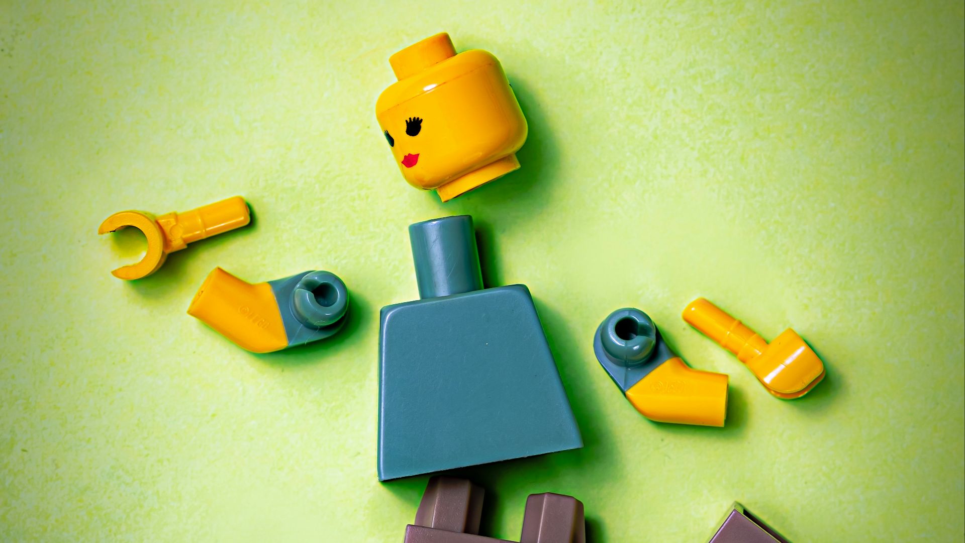 blue orange green and yellow plastic toy