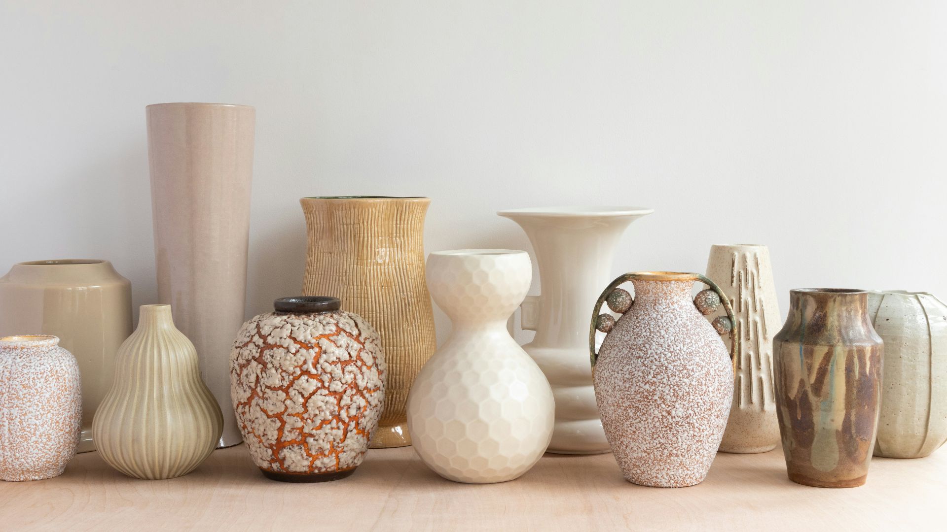 white and brown ceramic vase