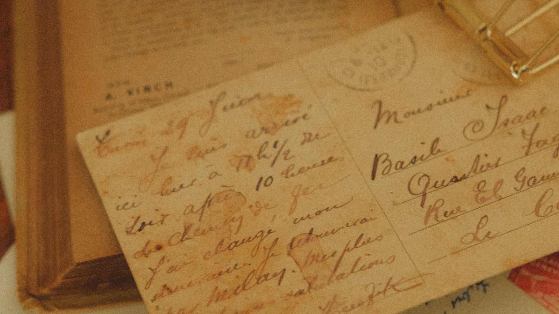 Cup of coffee on vintage letters and book