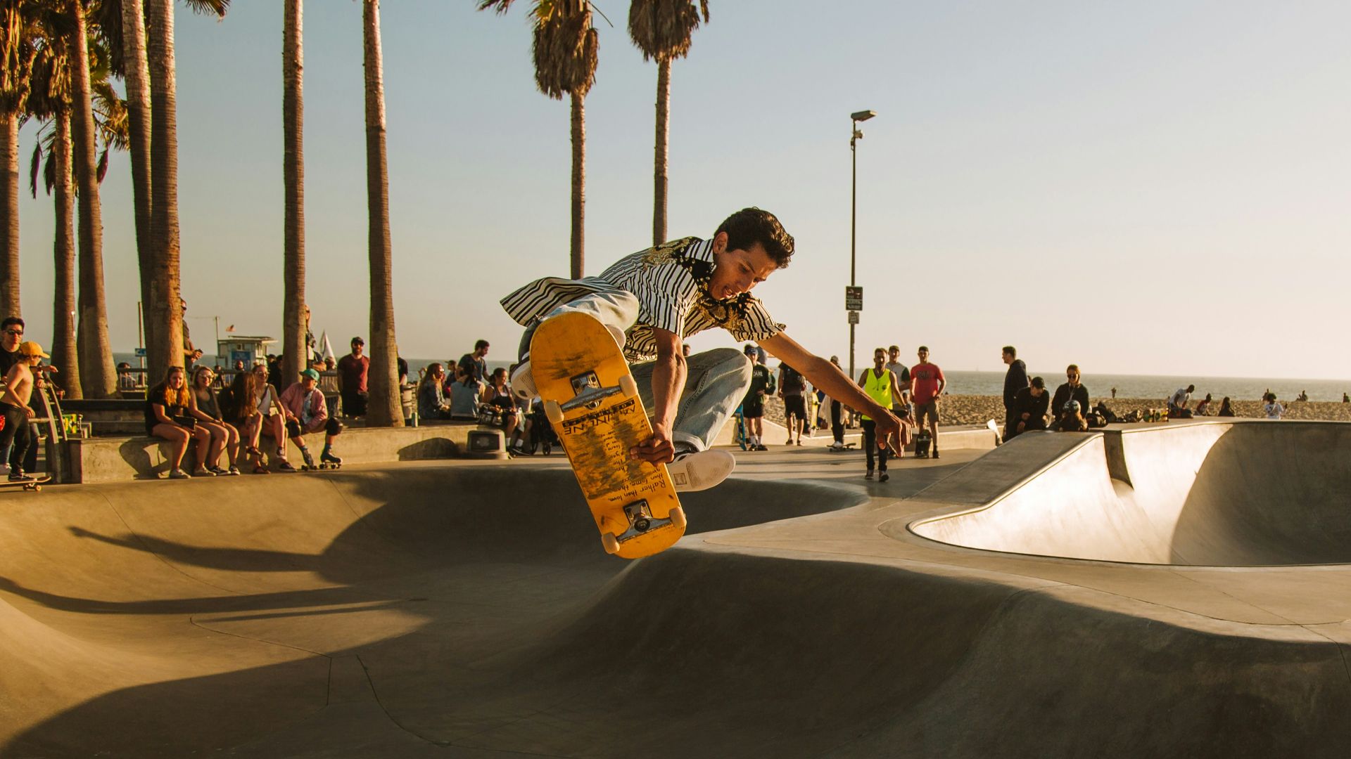 time-lapse photo of man riding skateboard at skate park