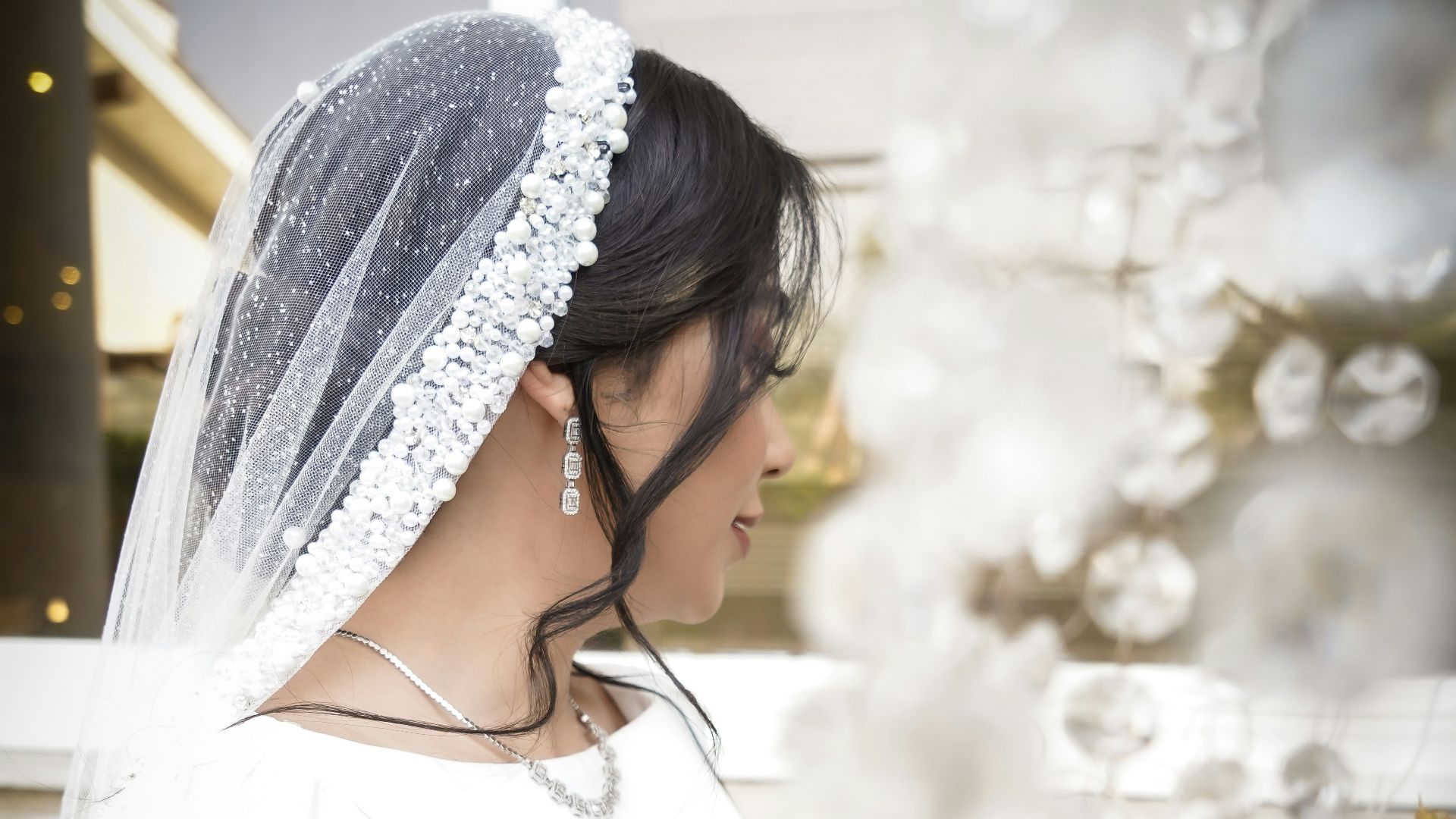 a person wearing a white dress