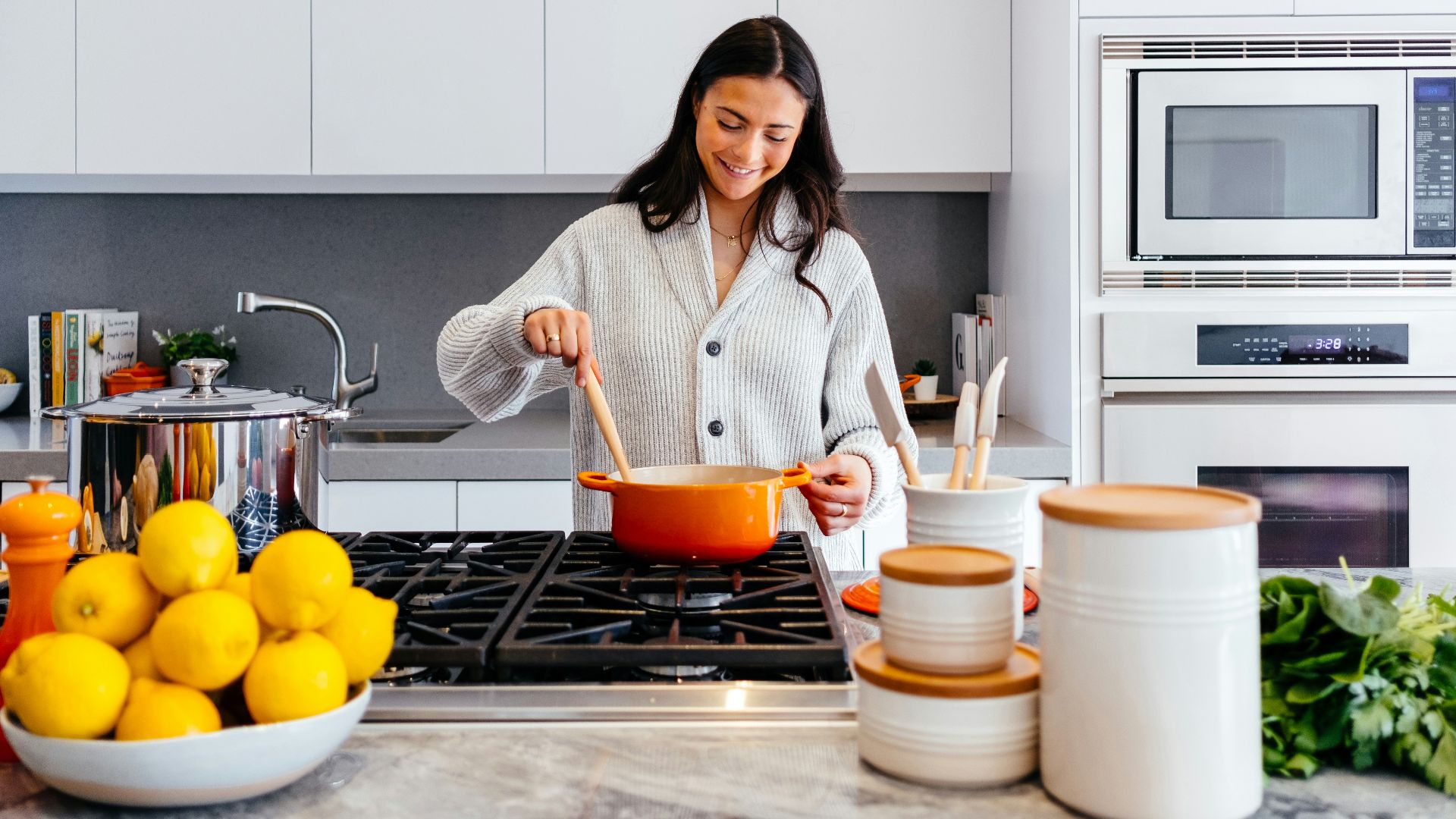 woman cooking inside kitchen room