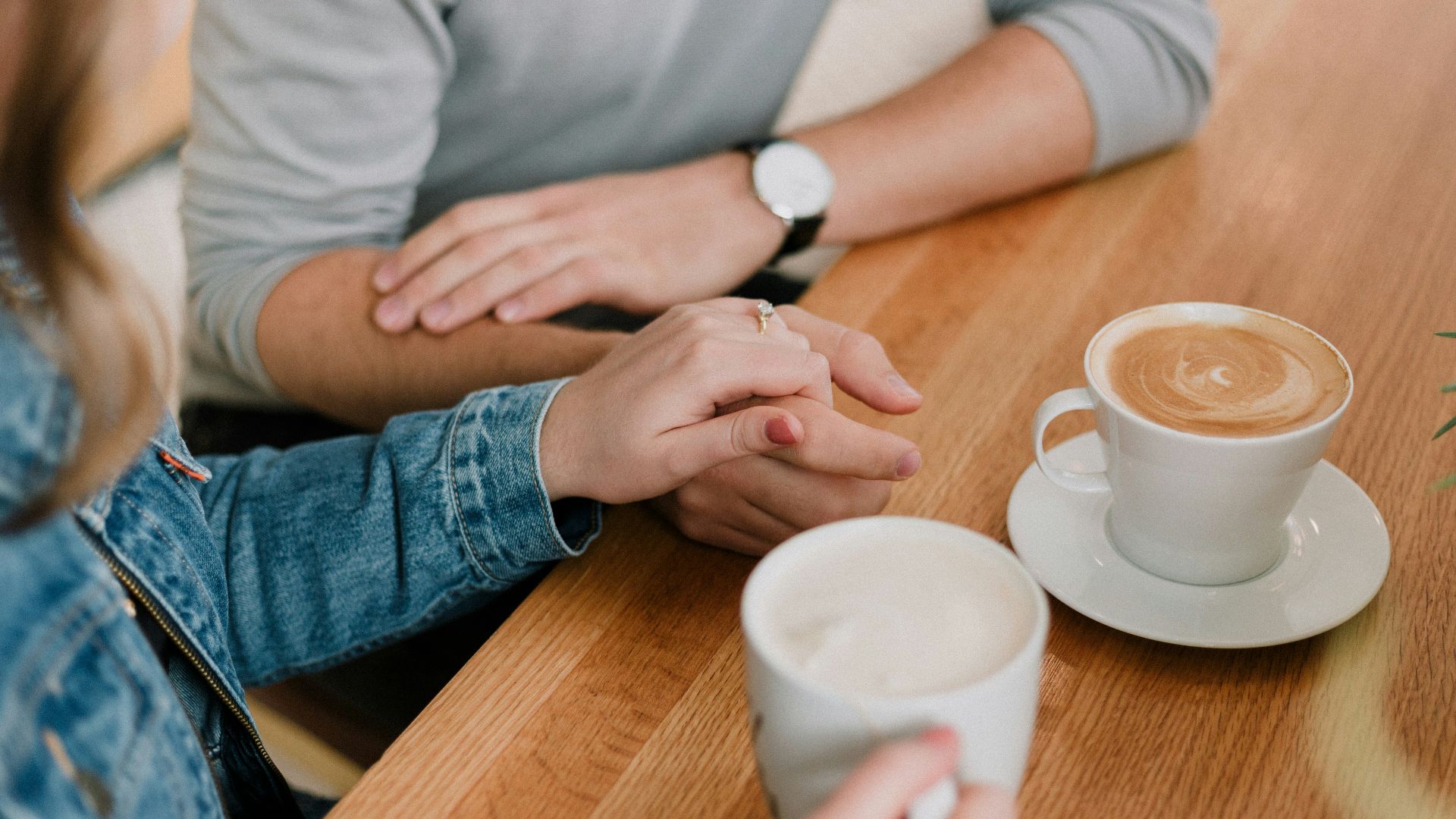 man and woman holding hands