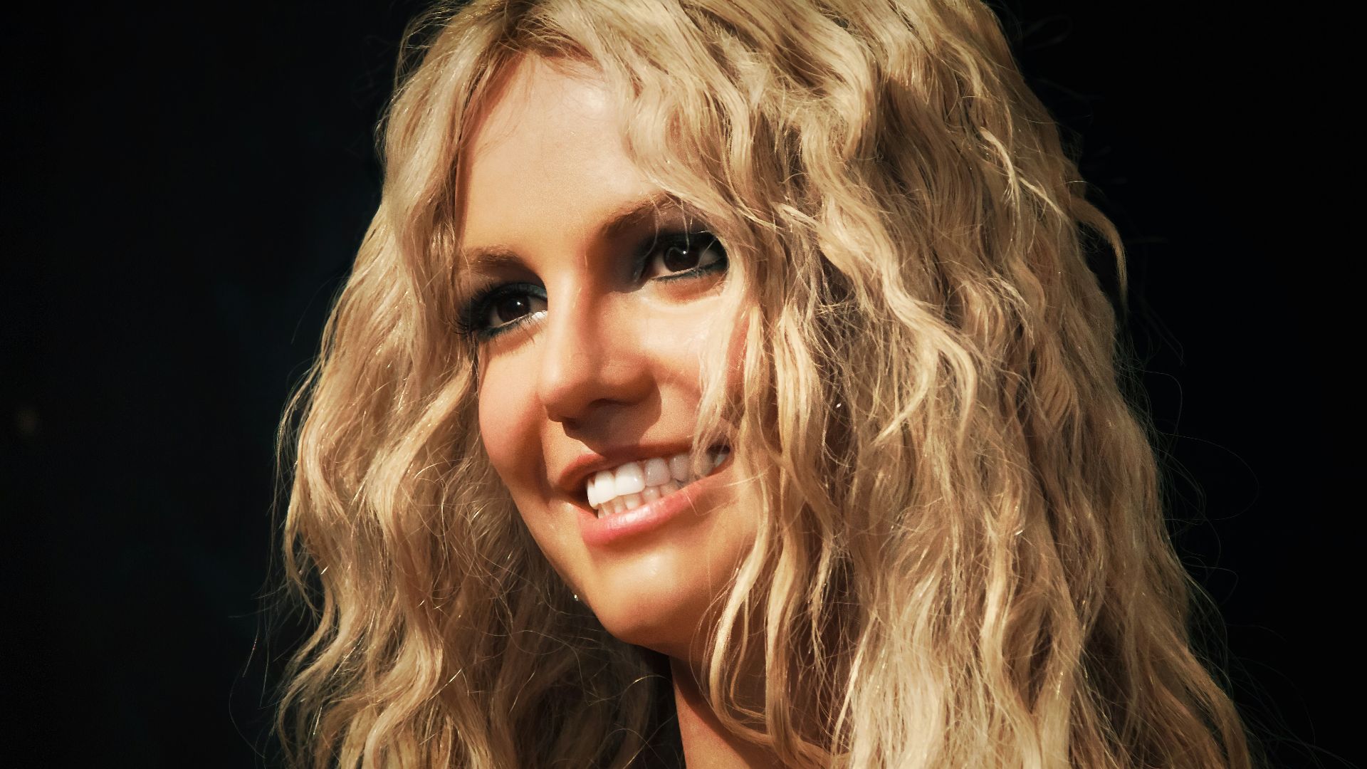 a close up of a person with blonde hair