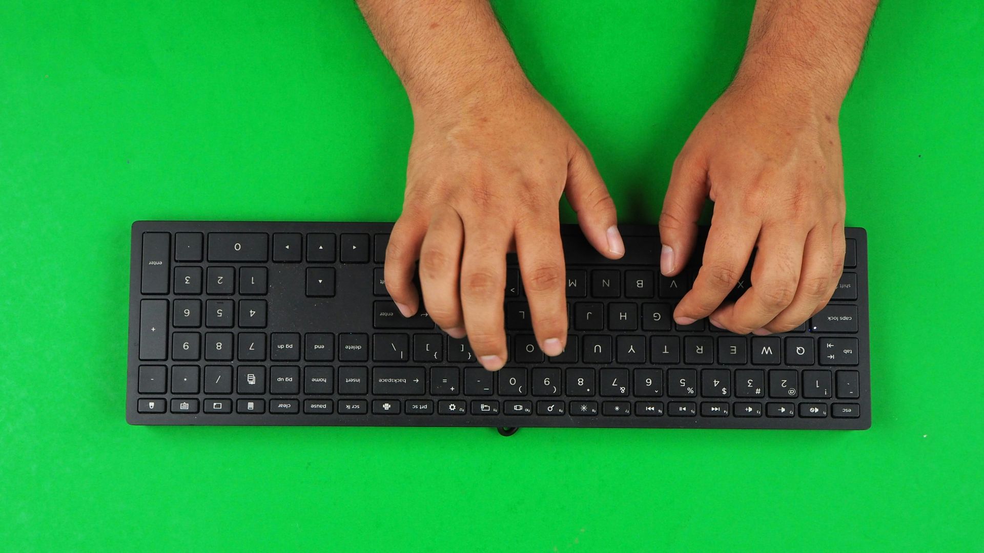 person typing on black keyboard