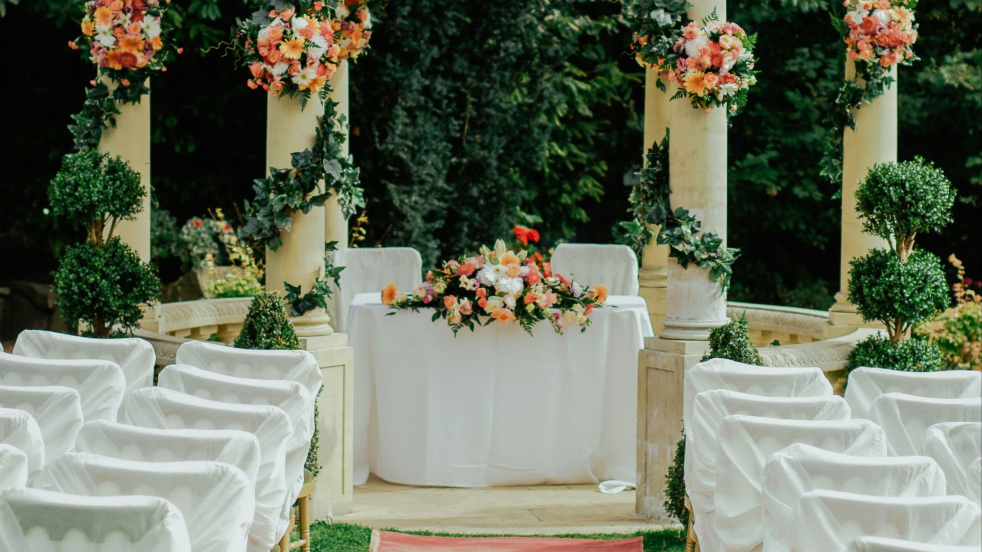 gray and beige gazebo near green leafed tree