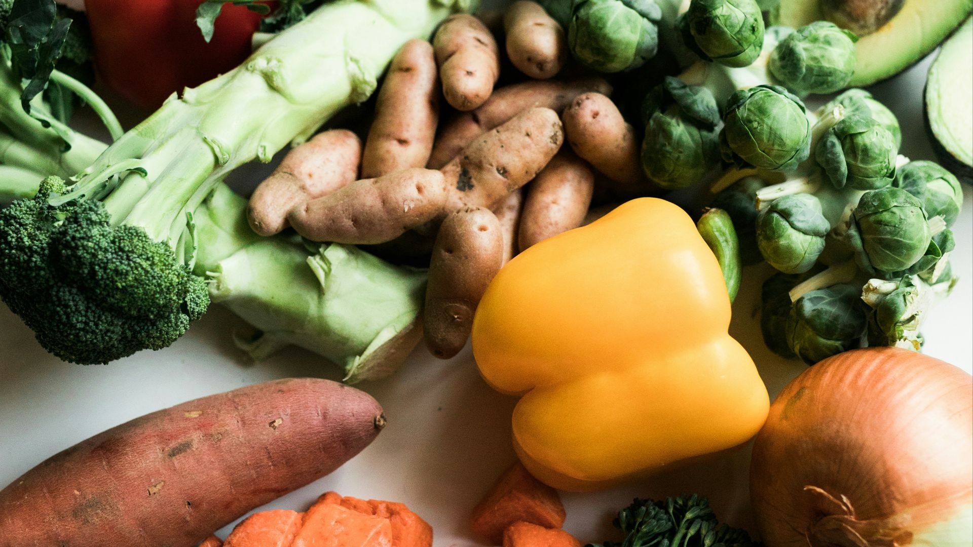 sliced carrots and green vegetable