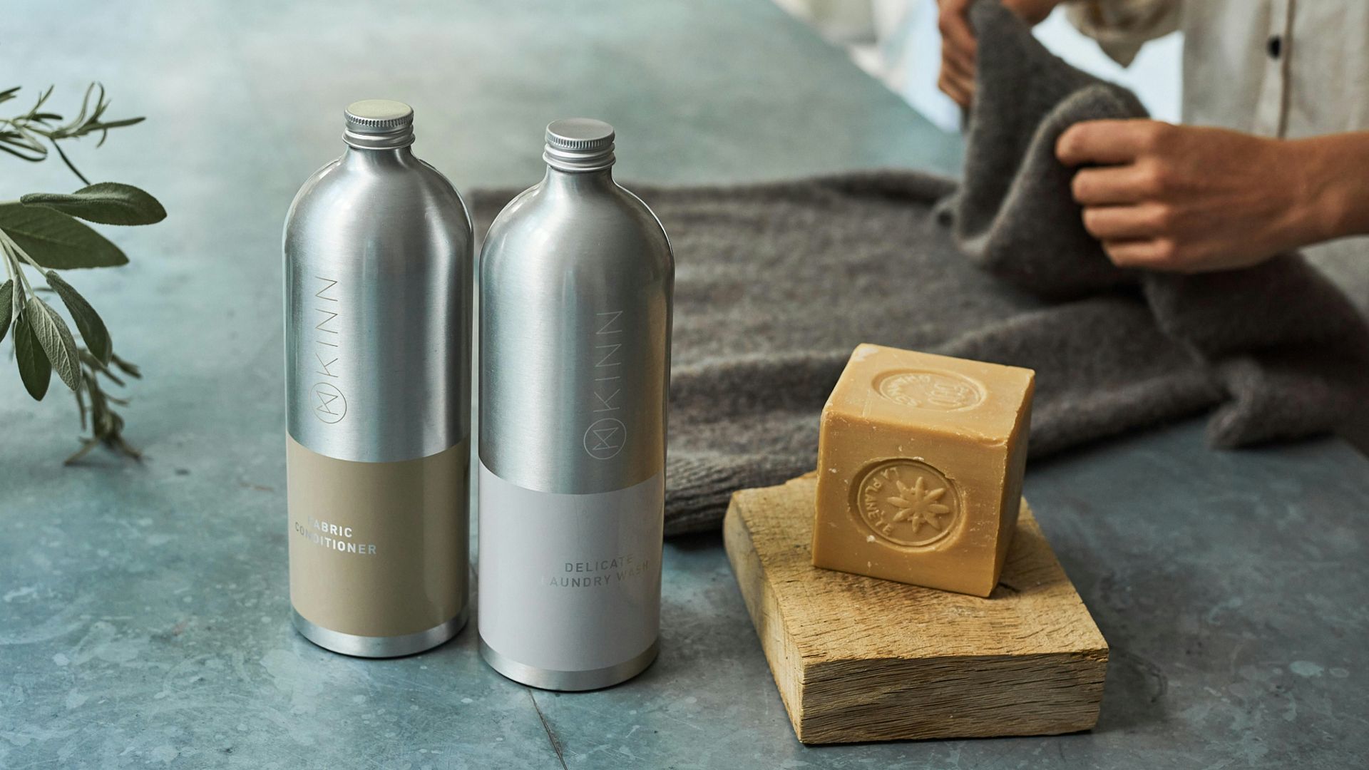 a couple of metal containers with metal objects on a table
