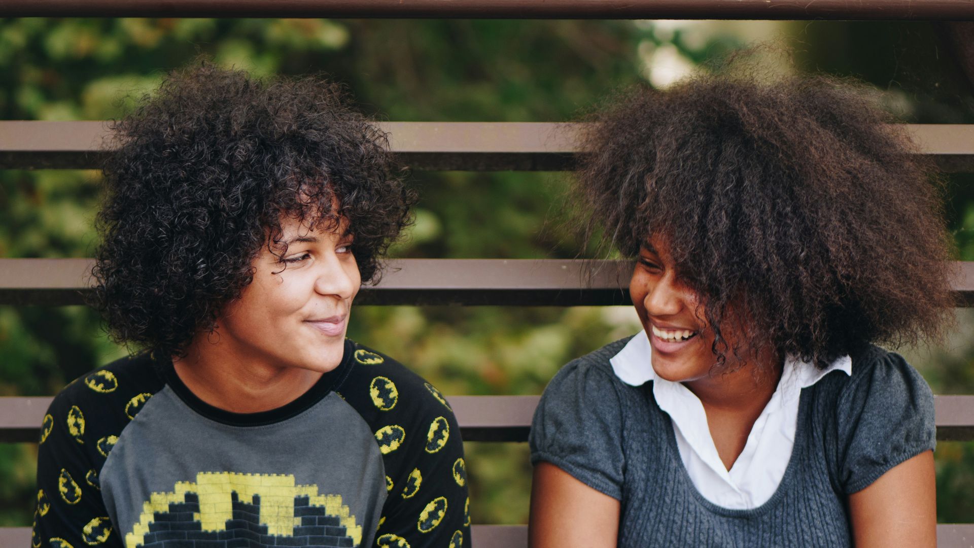 two persons staring at each other