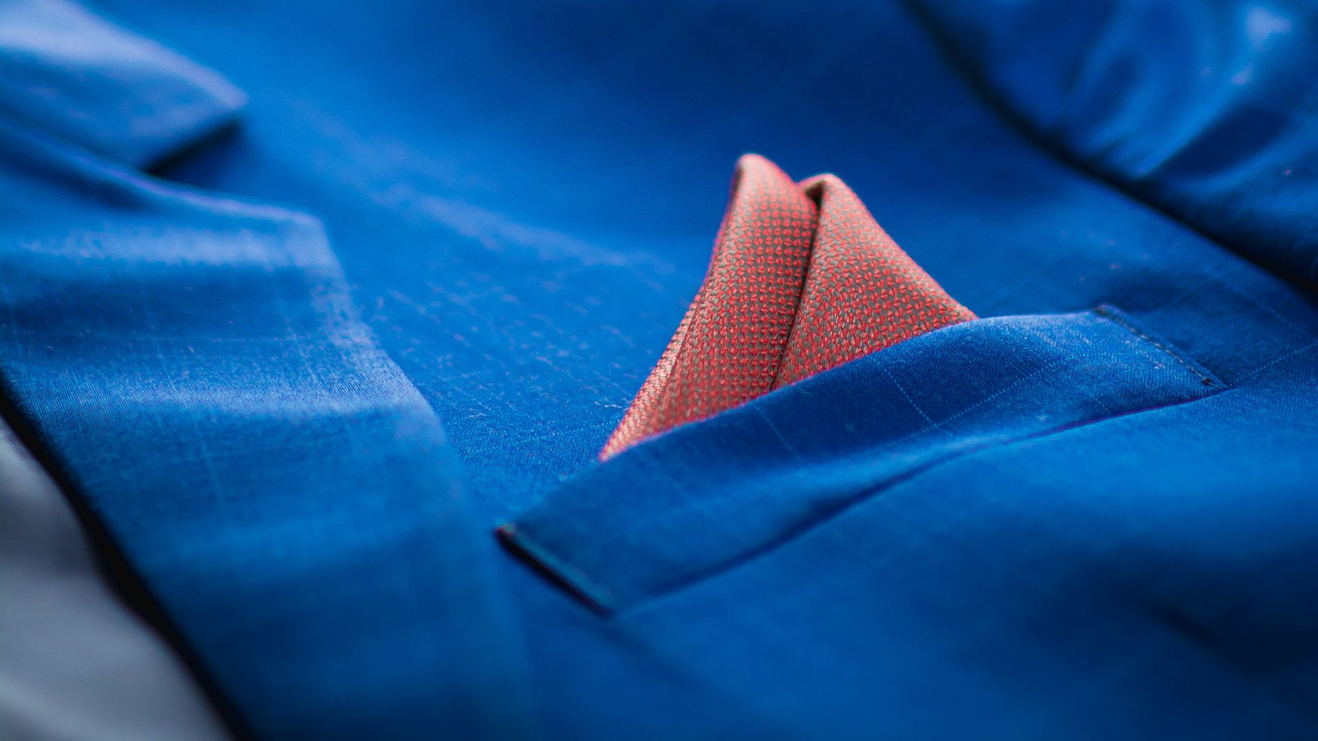 a person's feet on a blue blanket