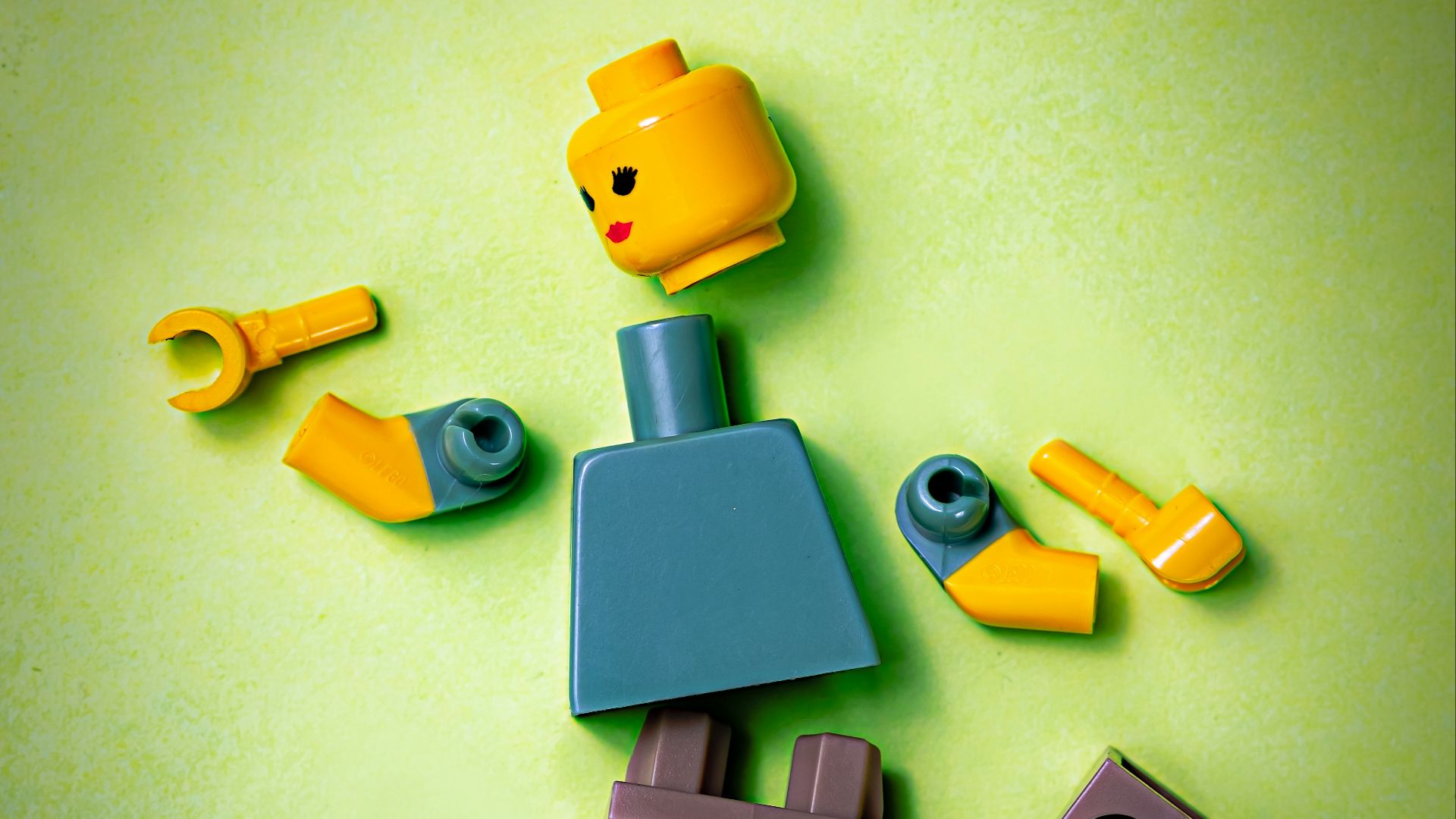 blue orange green and yellow plastic toy