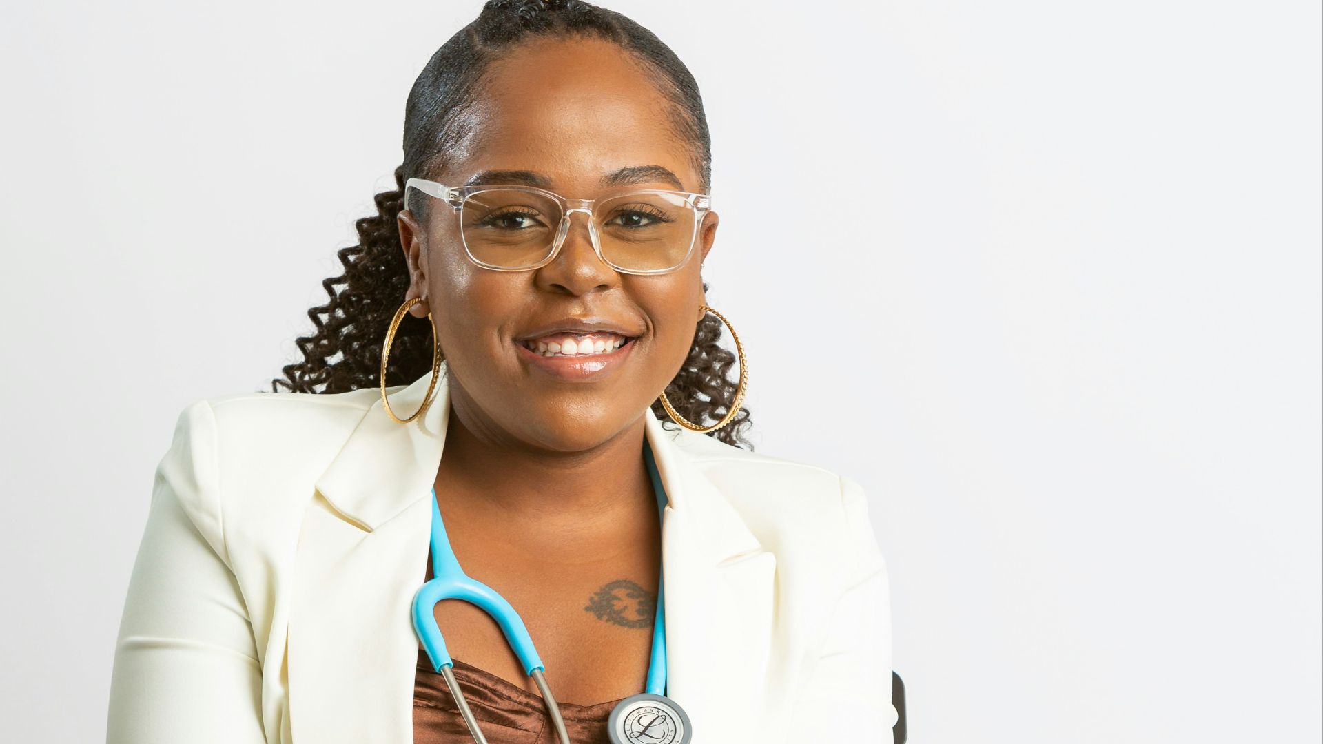 a woman in a white coat