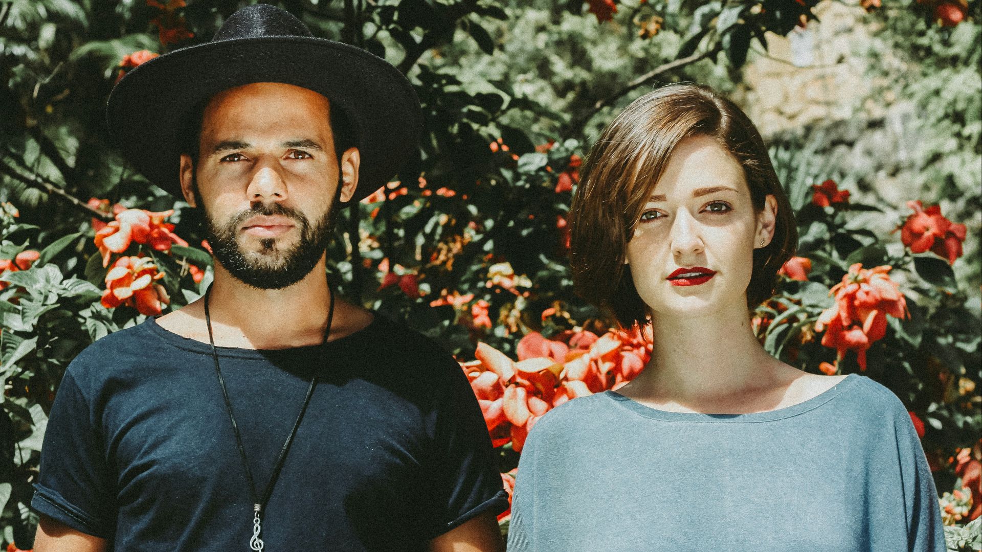 woman and man standing next each others