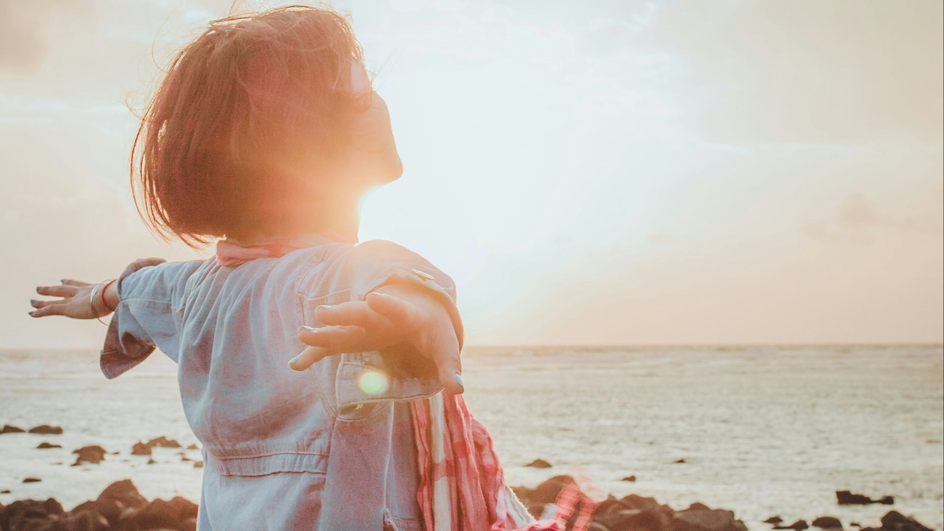 woman spreading her arms