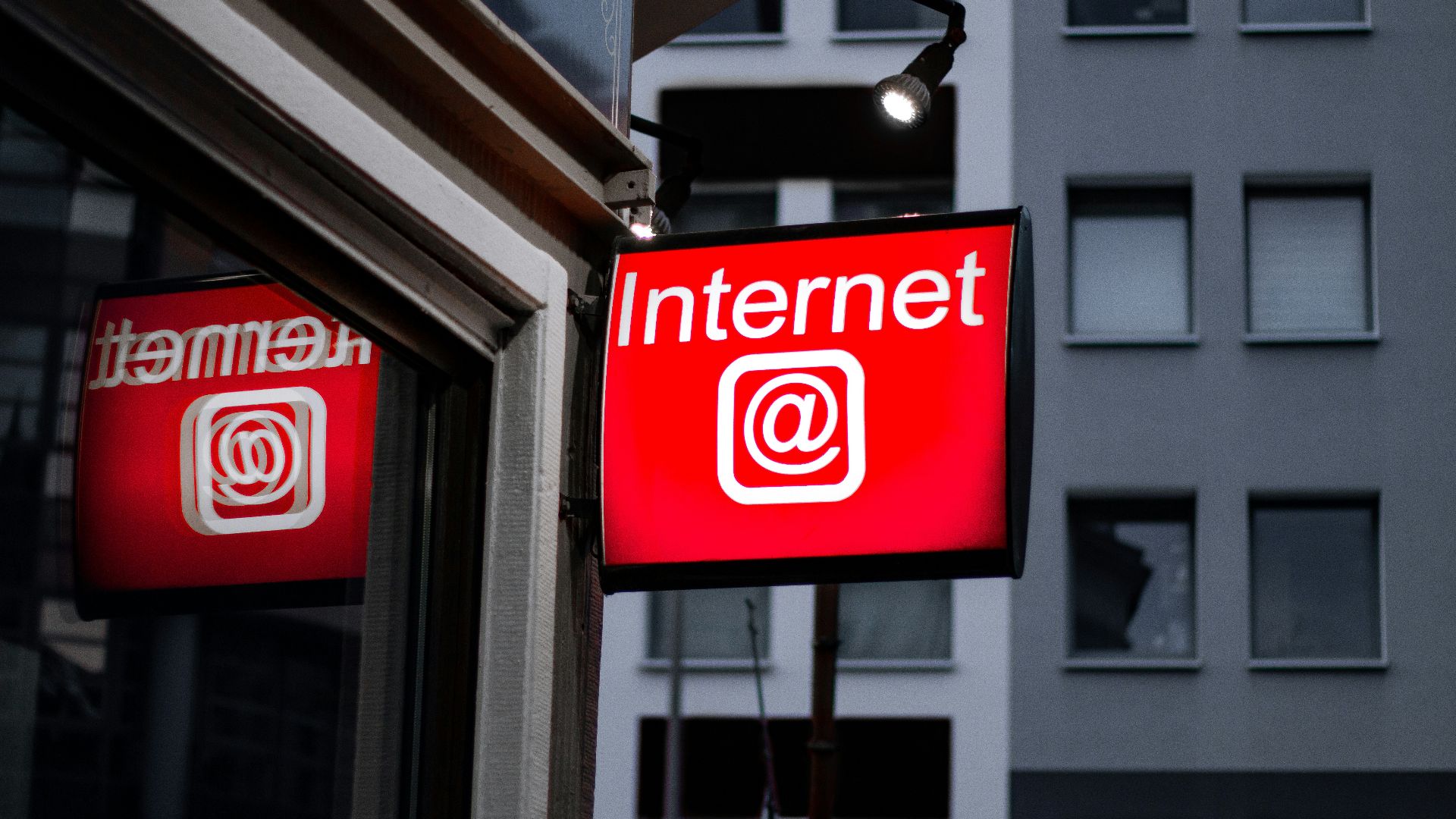 Internet LED signage beside building near buildings