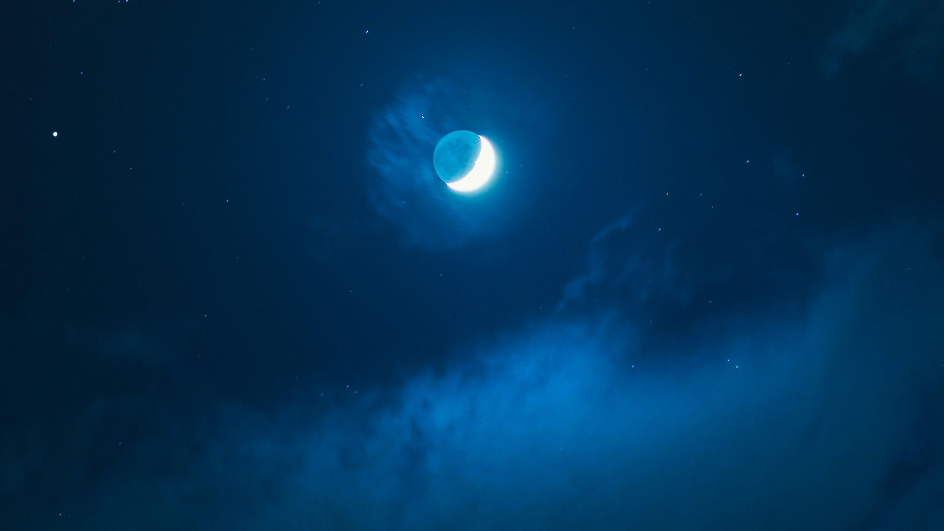 rocky shore under full moon