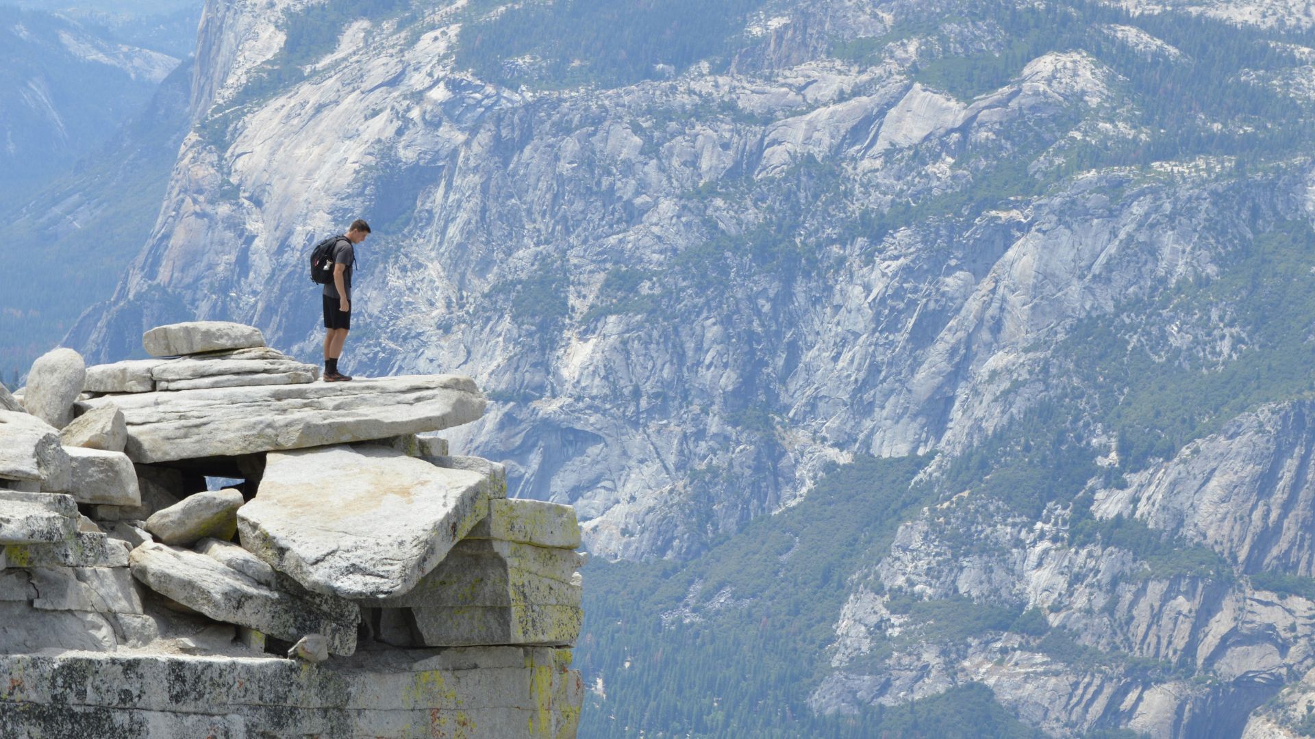 man standing near cliff