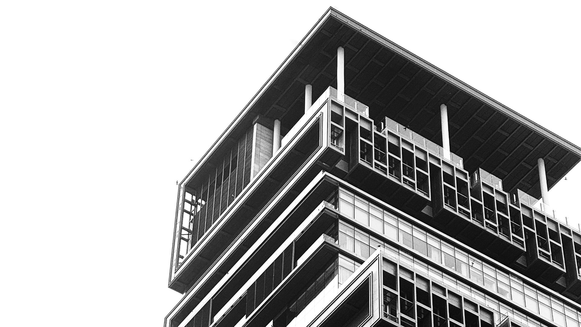 a black and white photo of a tall building