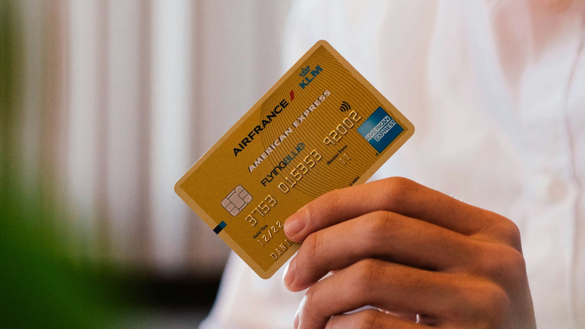 person holding credit card