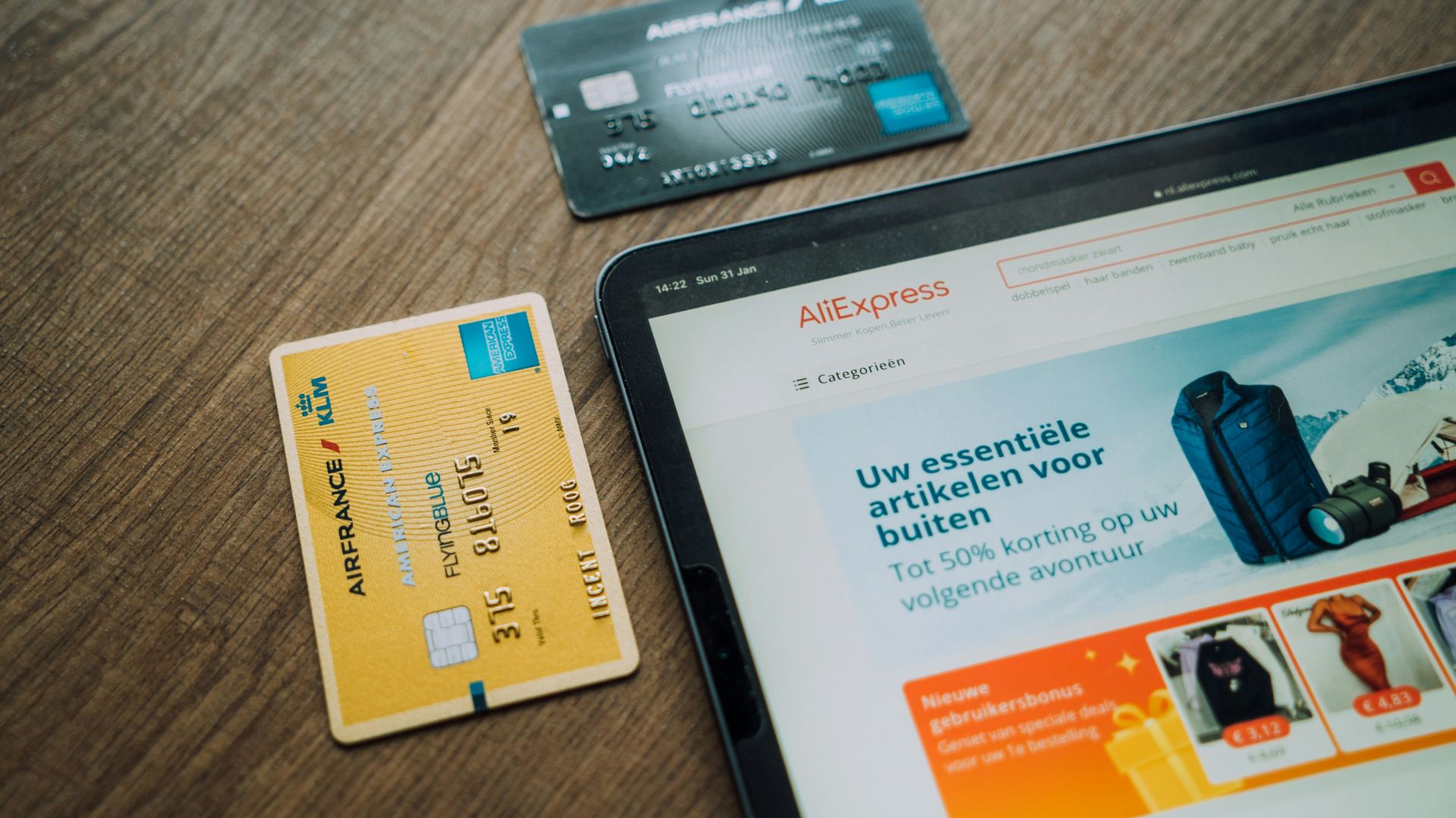 black android smartphone on brown wooden table