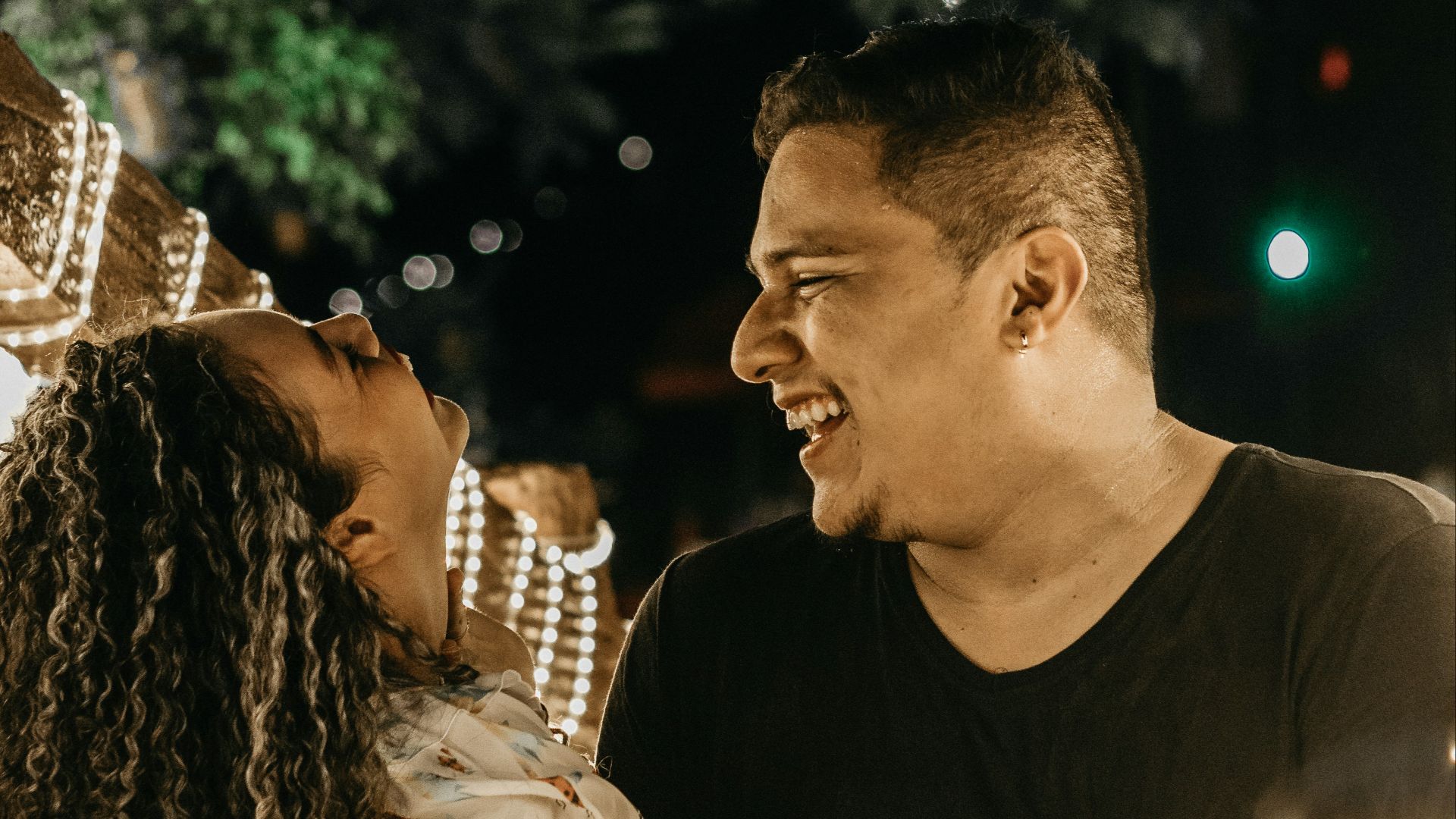 a man and a woman sitting next to each other