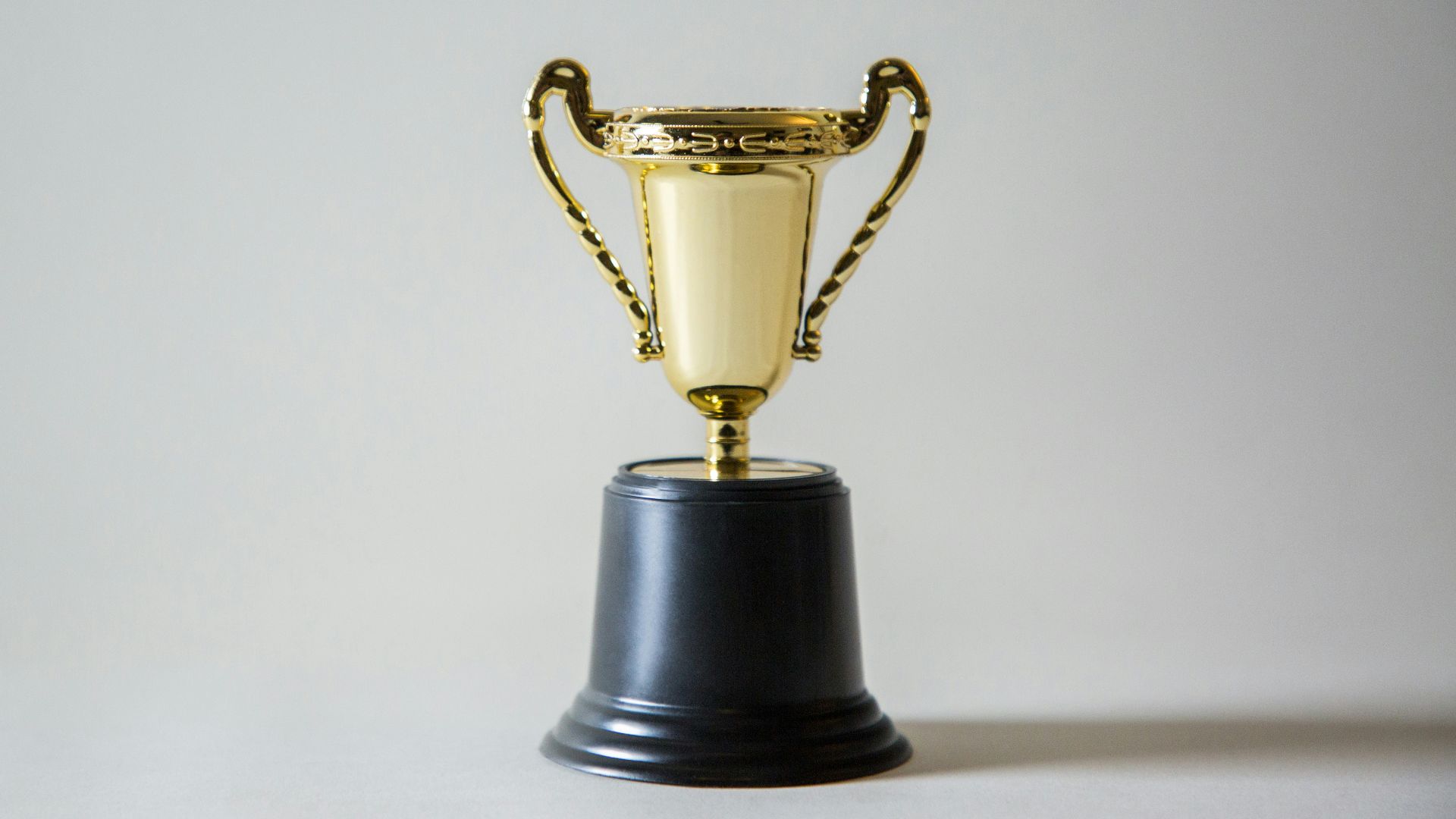 yellow and white trophy