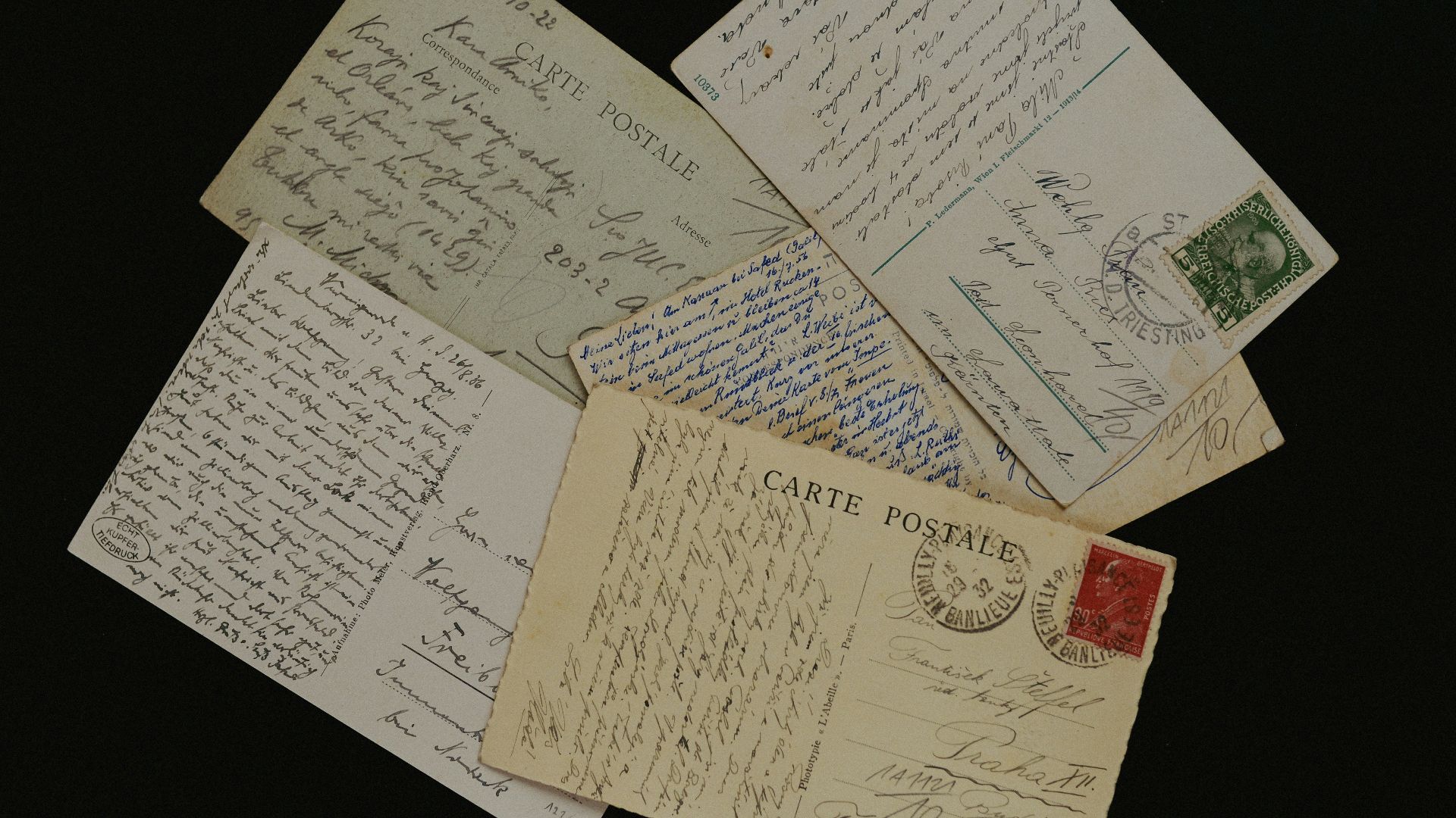 a pile of old envelopes sitting on top of each other