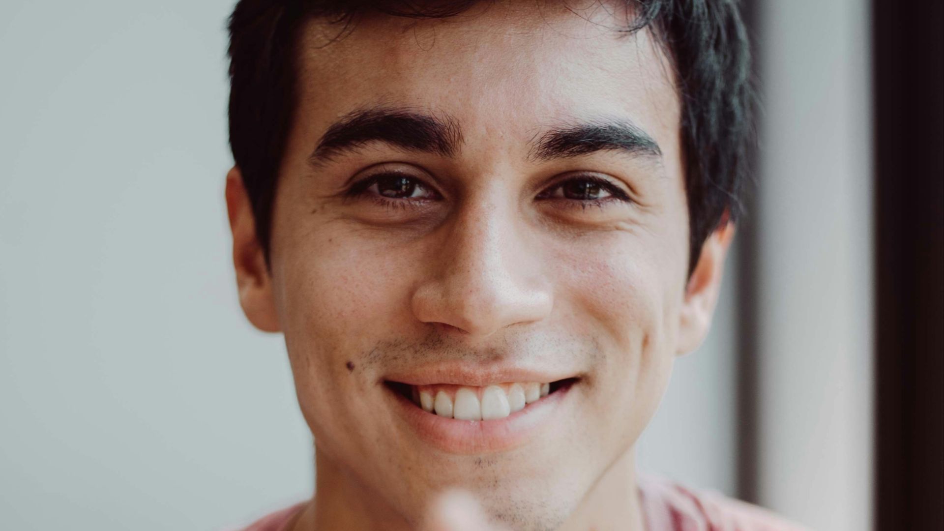 man in red crew neck shirt