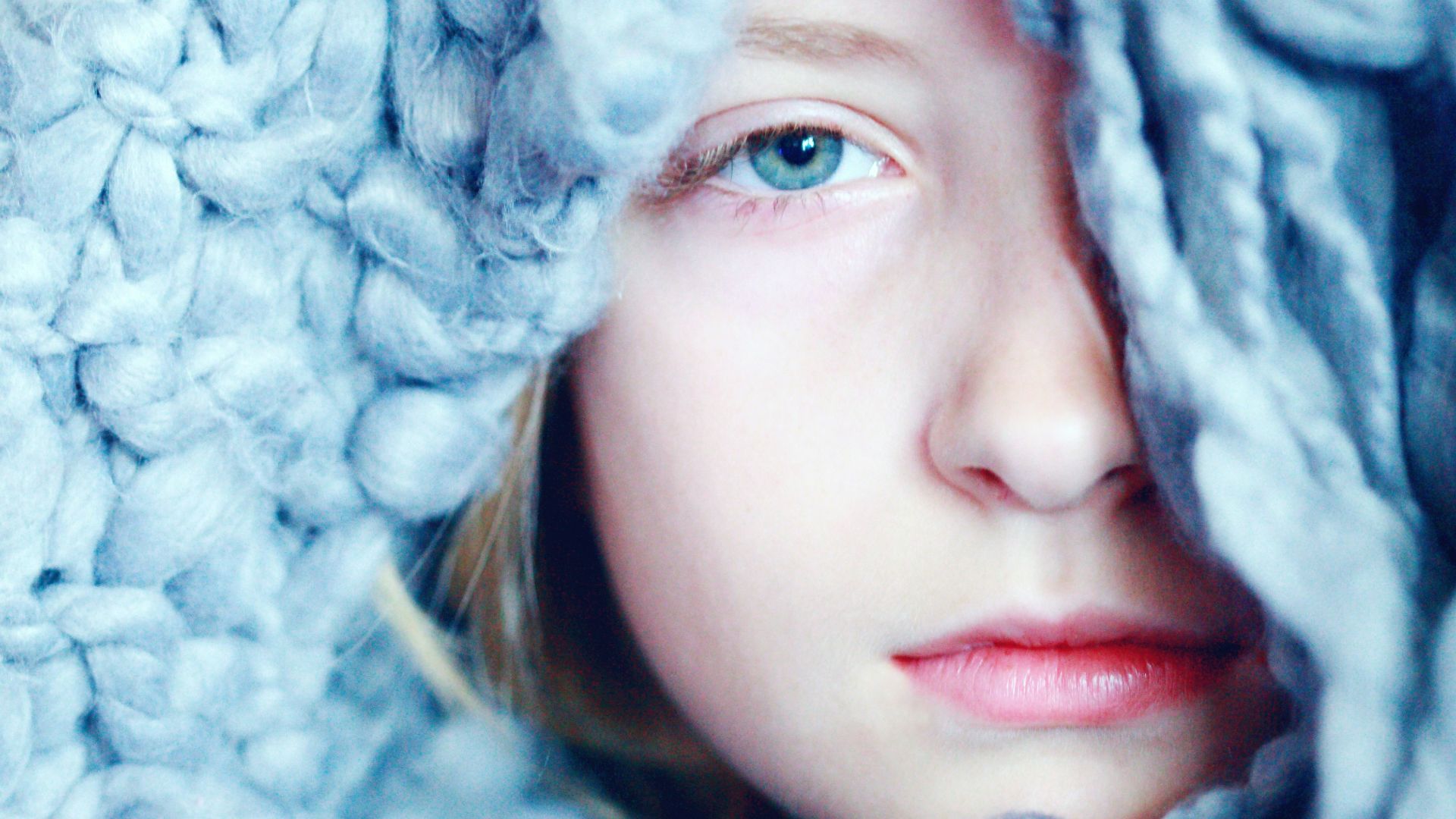 woman with white fur scarf